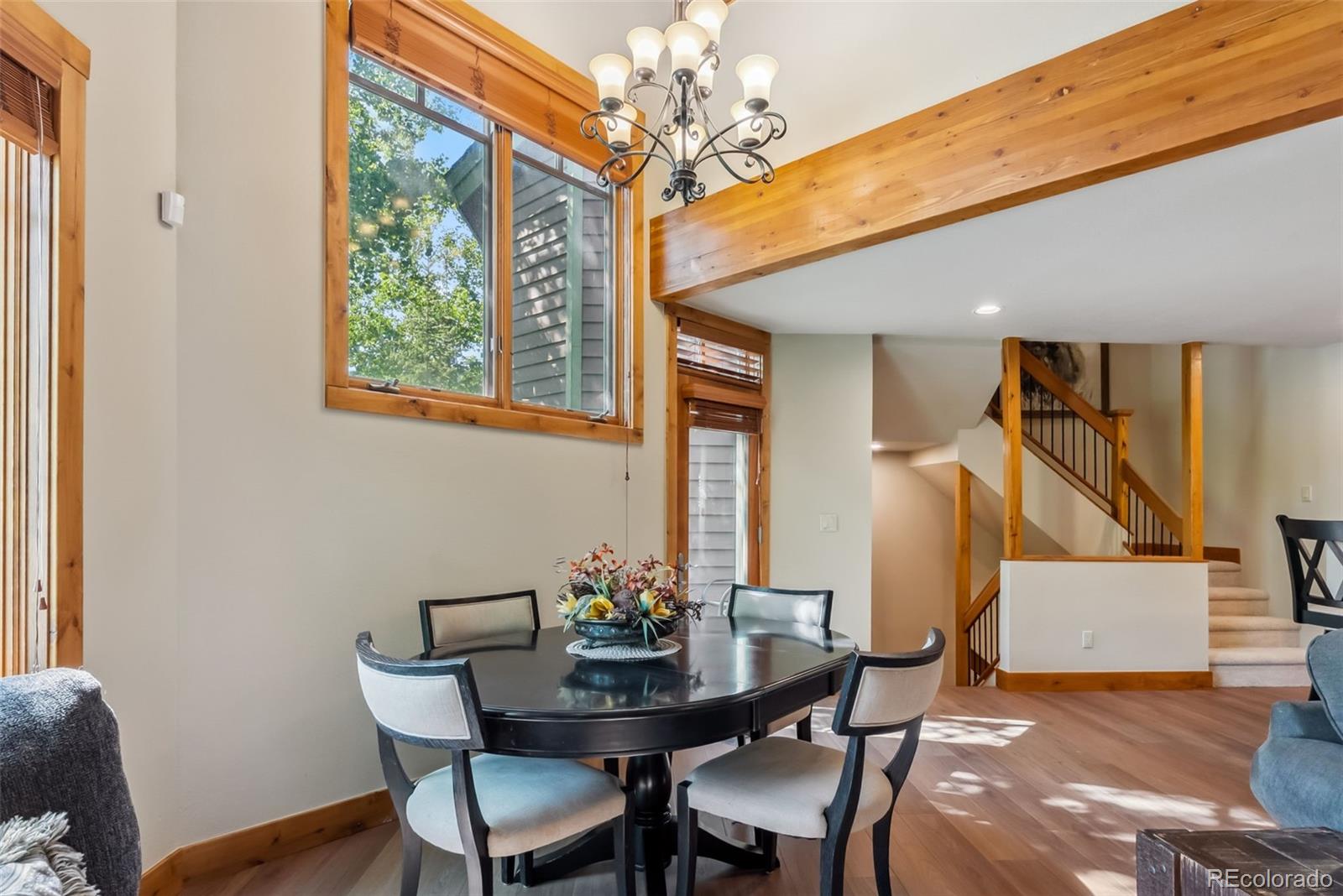 0024 Rasor Drive Dillon, CO 80435 - Photo 7 of 37 a view of a dining room with furniture and wooden floor
