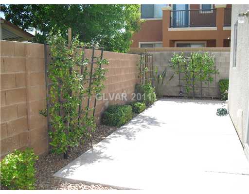 7191 Dicentra Road Las Vegas, NV 89113 - Photo 9 of 14 Yard/Garden. Full wrap around patio with beautiful landscaping