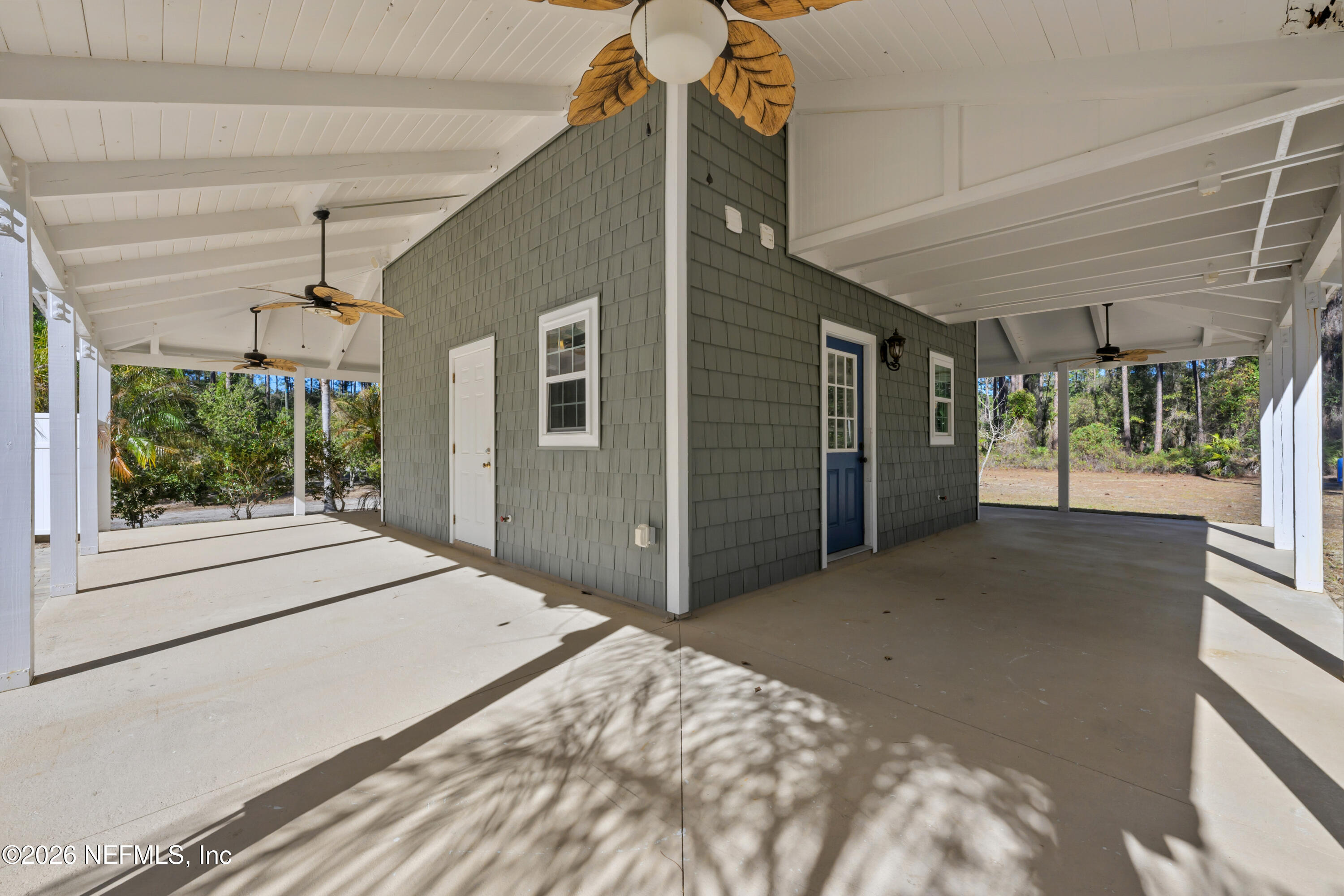 179 Georgetown Denver Road Georgetown, FL 32139 - Photo 9 of 24 a view of backyard with large windows