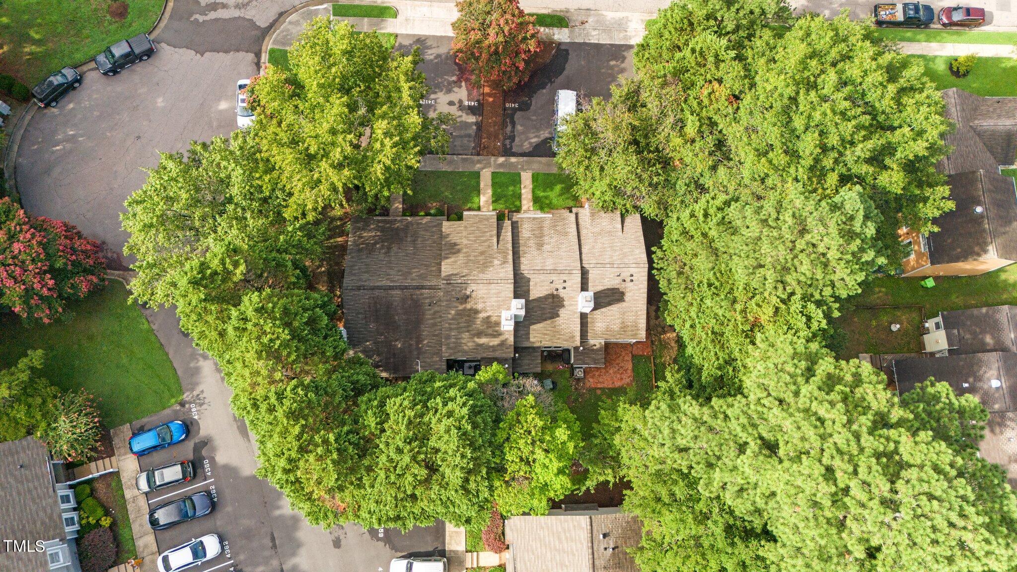 3408 Comstock Road Raleigh, NC 27604 - Photo 30 of 33 an aerial view of a house with a yard
