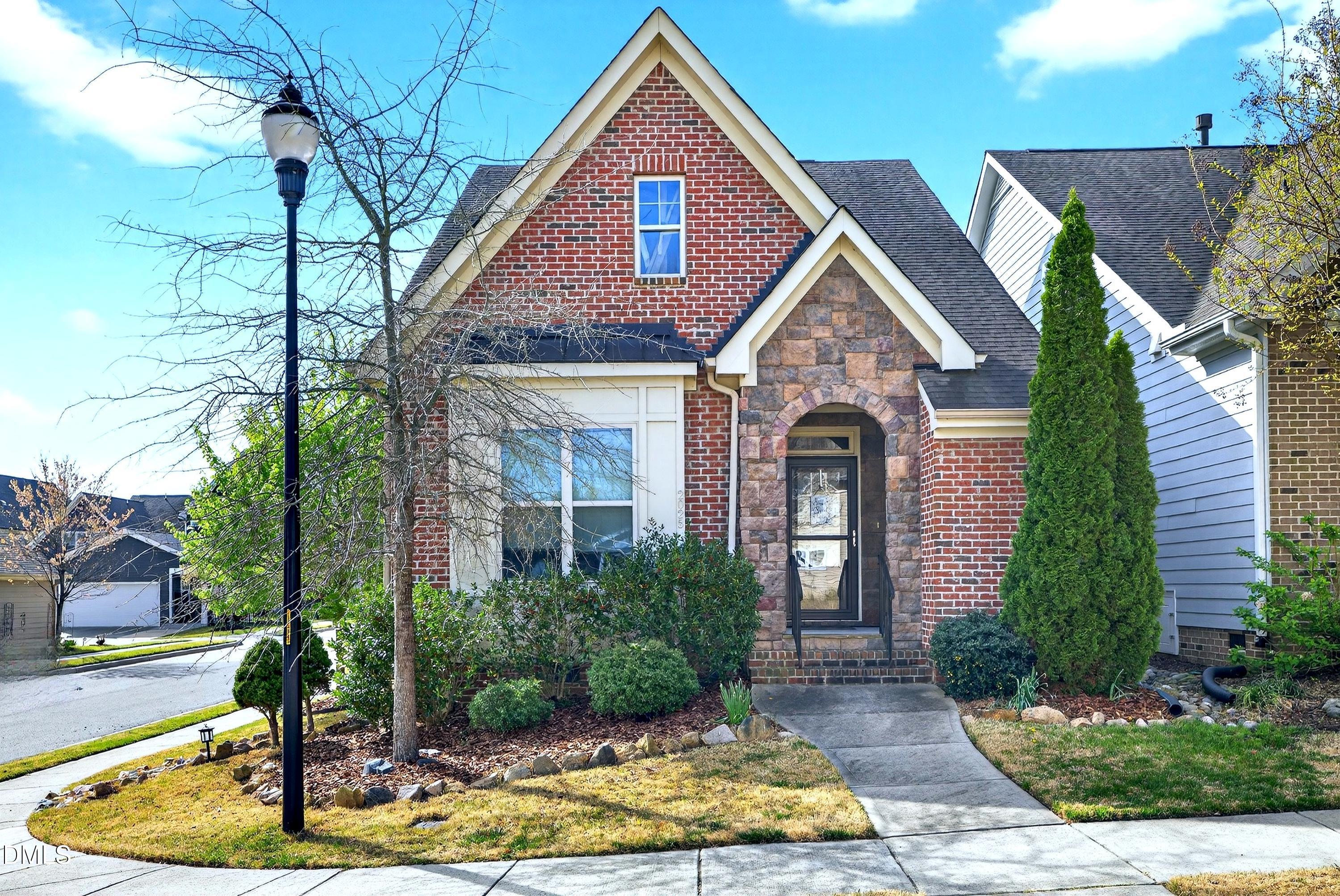 2025 Great Ridge Parkway Chapel Hill, NC 27516 - Photo 1 of 61 a front view of a house with a yard