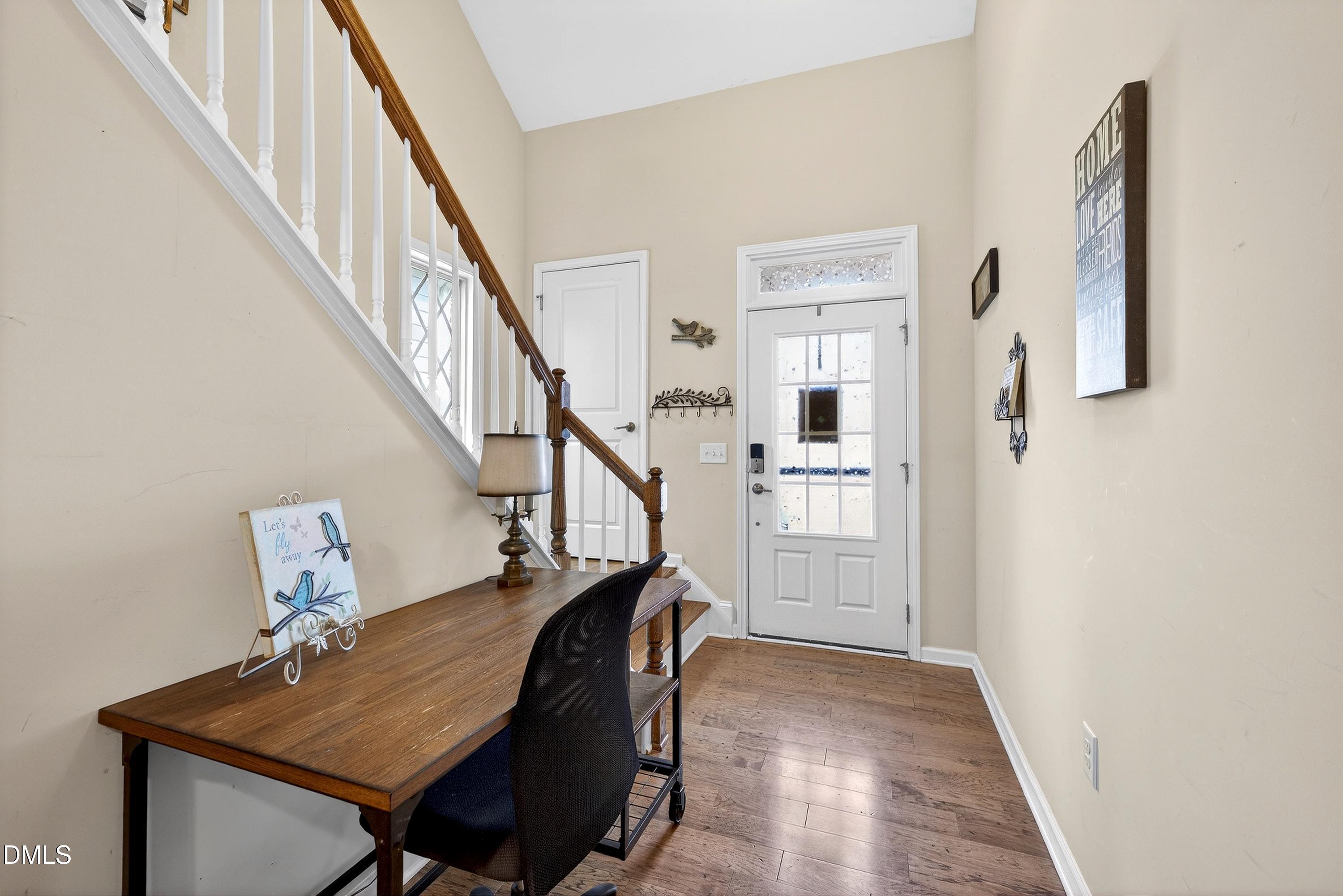 2025 Great Ridge Parkway Chapel Hill, NC 27516 - Photo 16 of 61 a view of entryway and hall with wooden floor