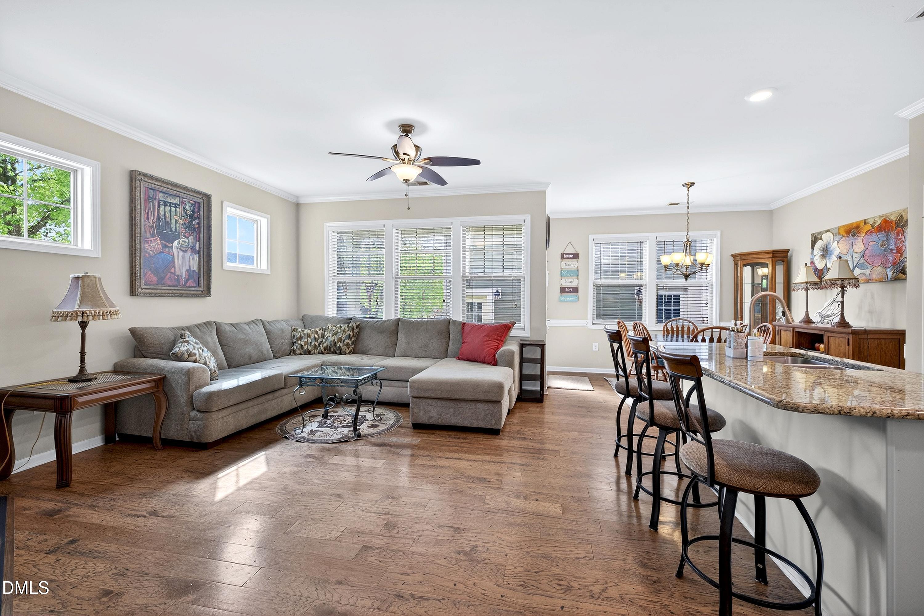2025 Great Ridge Parkway Chapel Hill, NC 27516 - Photo 2 of 61 a living room with furniture and a view of kitchen