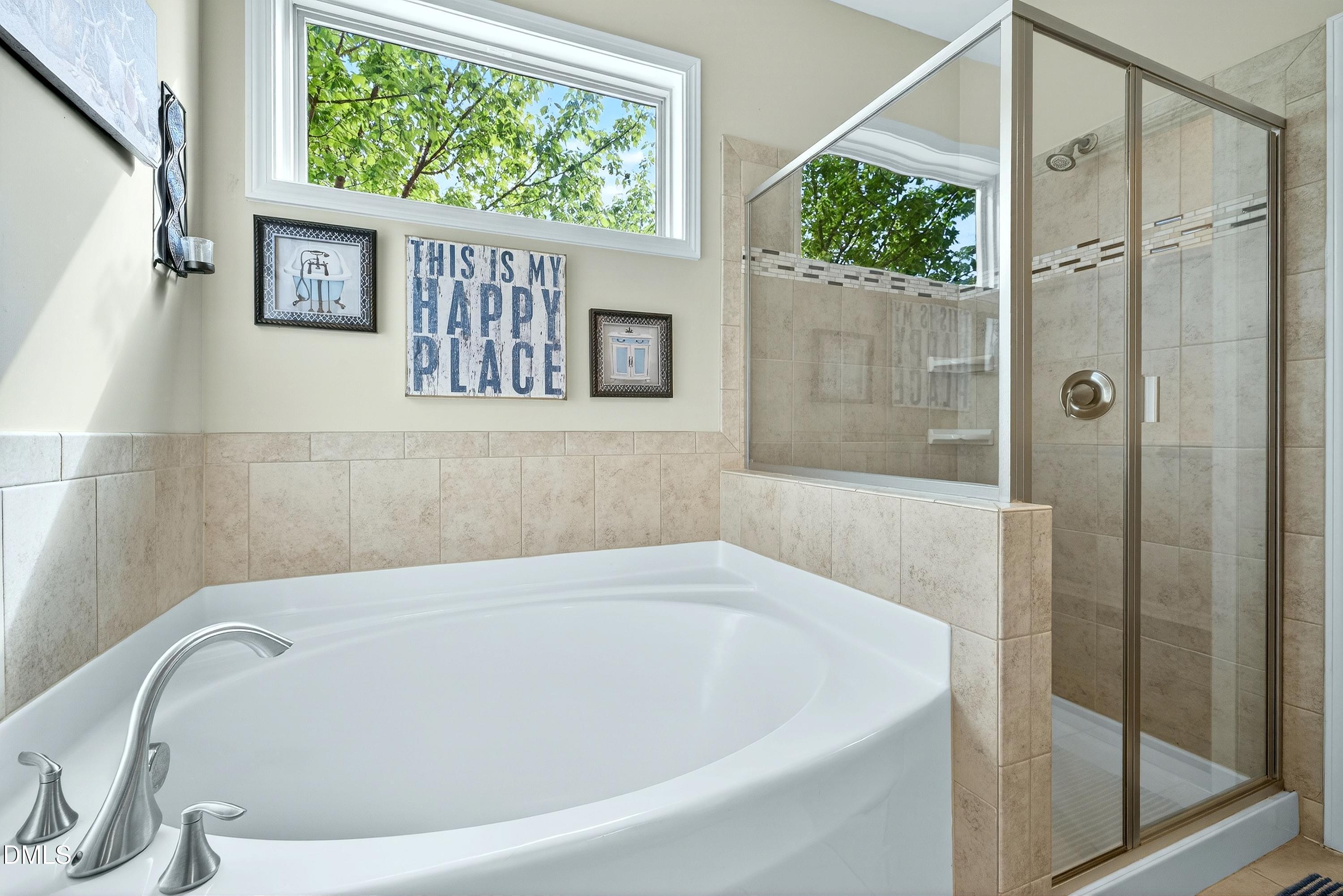 2025 Great Ridge Parkway Chapel Hill, NC 27516 - Photo 26 of 61 a bathroom with a bathtub and a shower