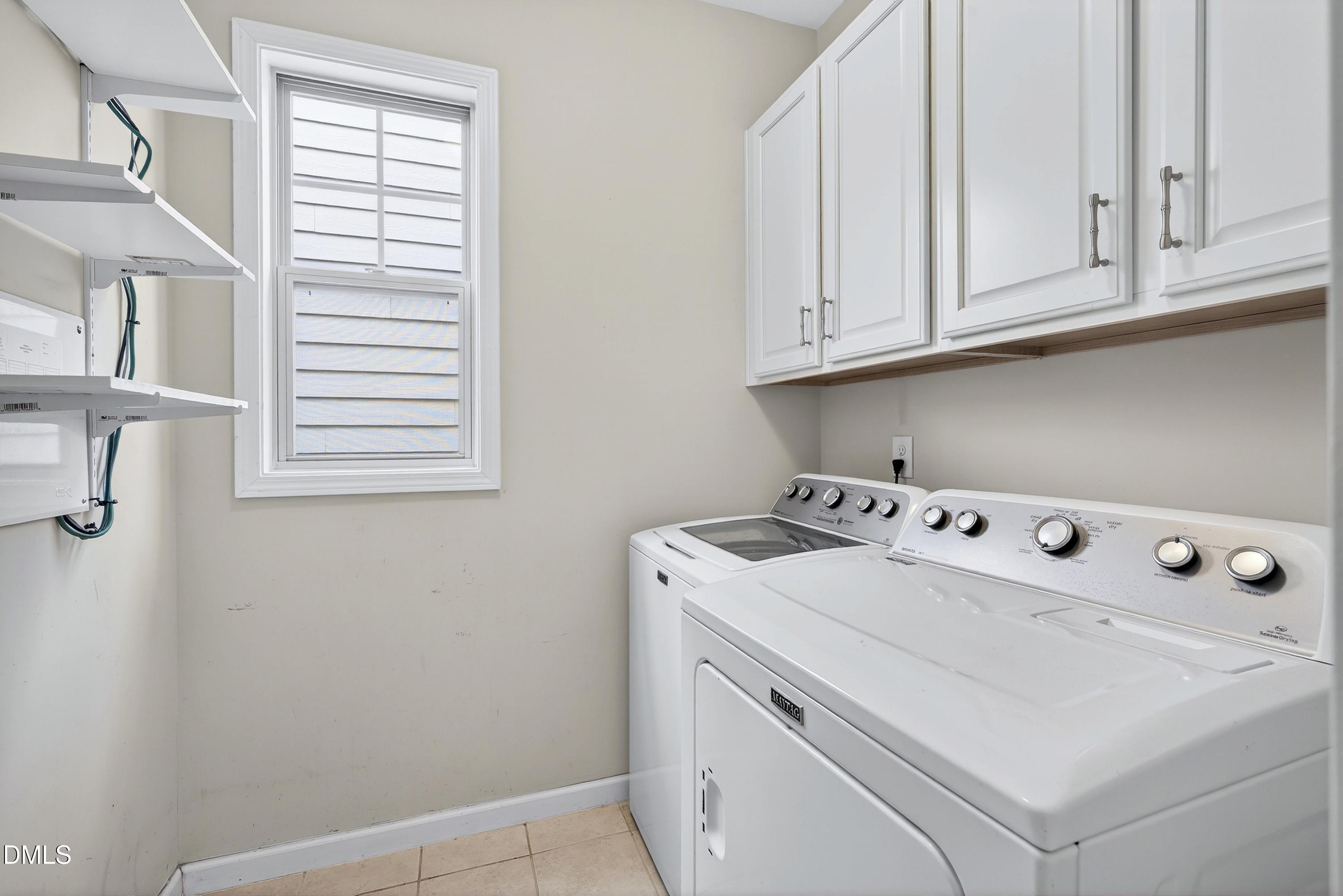 2025 Great Ridge Parkway Chapel Hill, NC 27516 - Photo 37 of 61 a utility room with dryer and washer