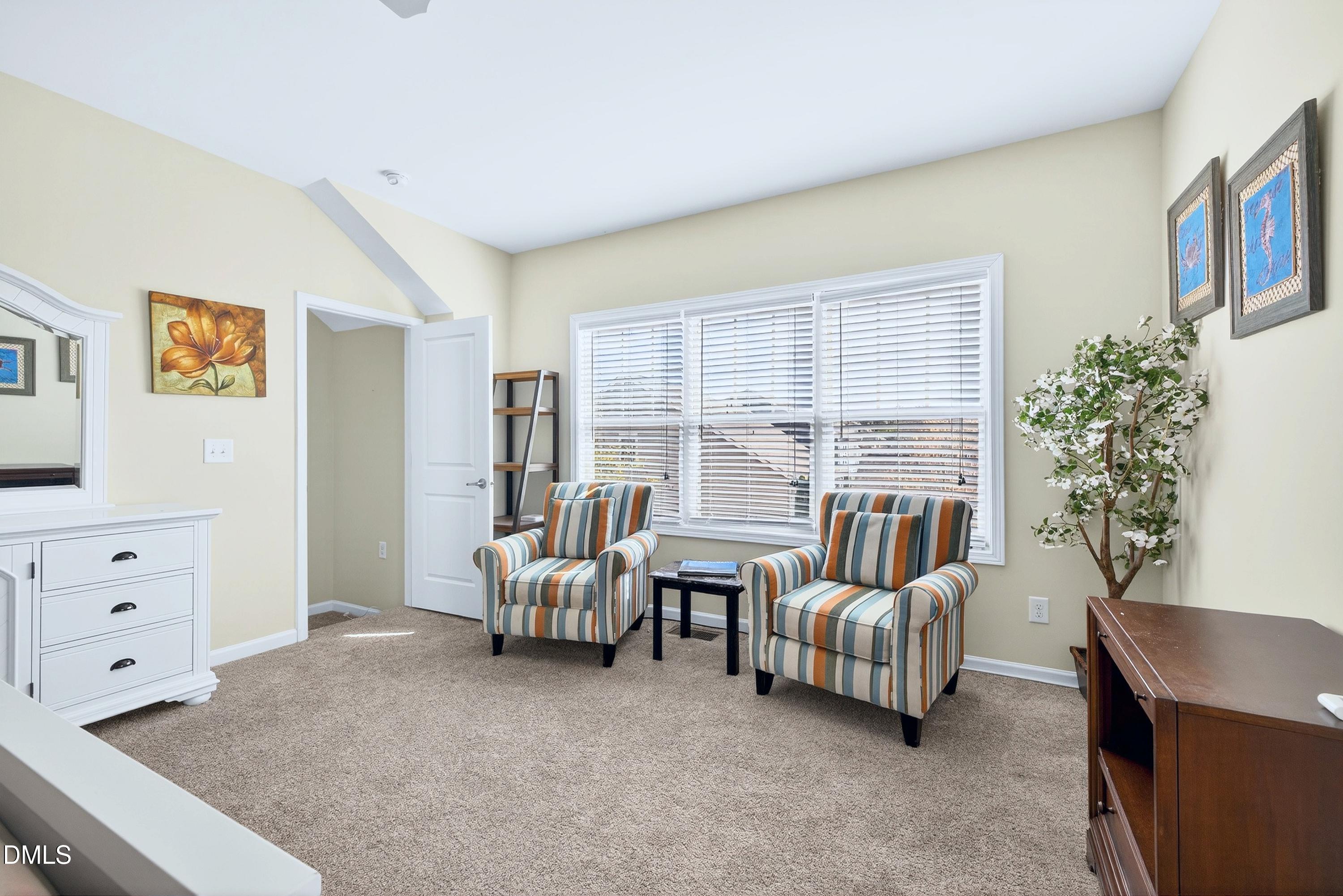 2025 Great Ridge Parkway Chapel Hill, NC 27516 - Photo 43 of 61 a living room with furniture and a potted plant