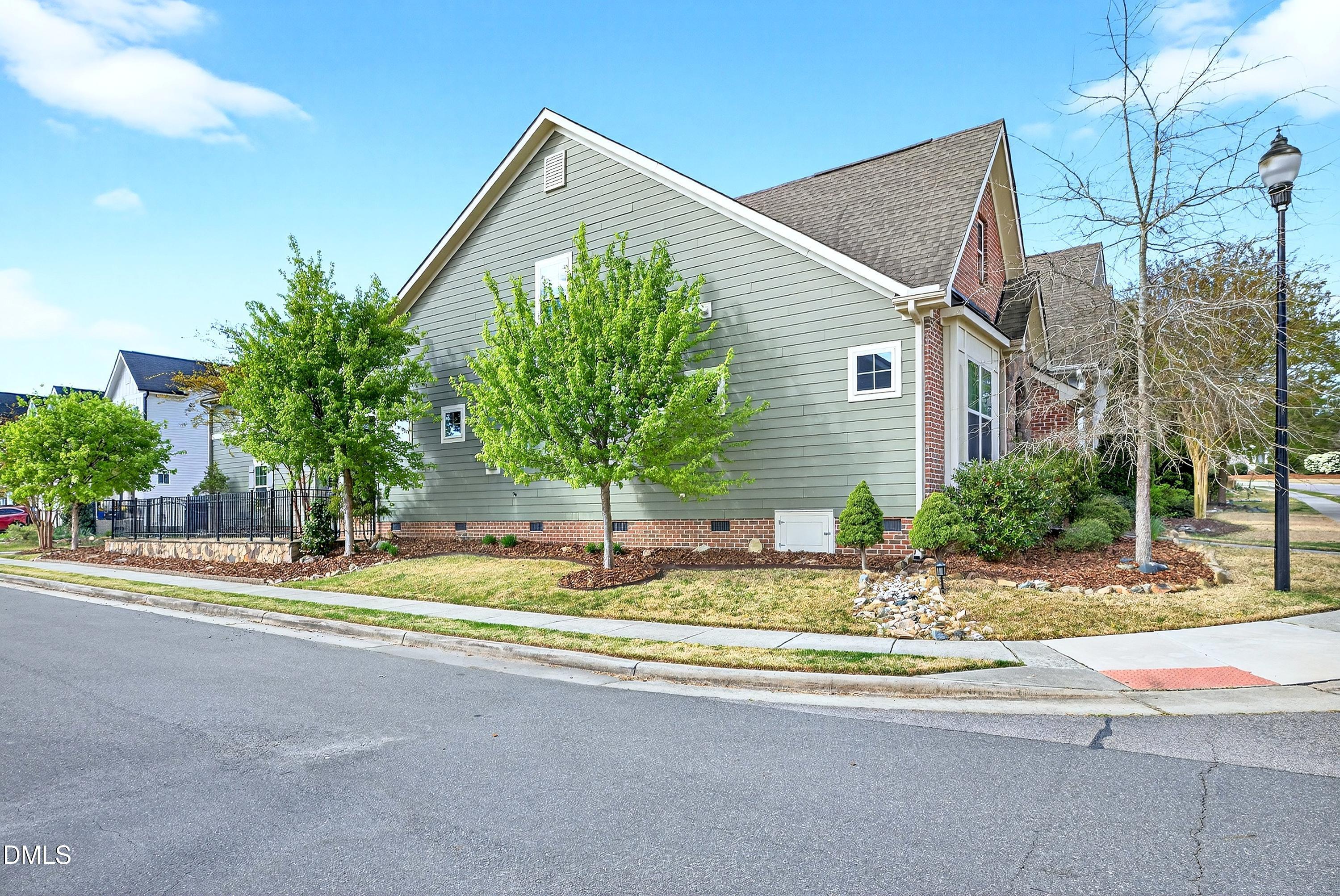 2025 Great Ridge Parkway Chapel Hill, NC 27516 - Photo 48 of 61 a house that has a tree in front of it