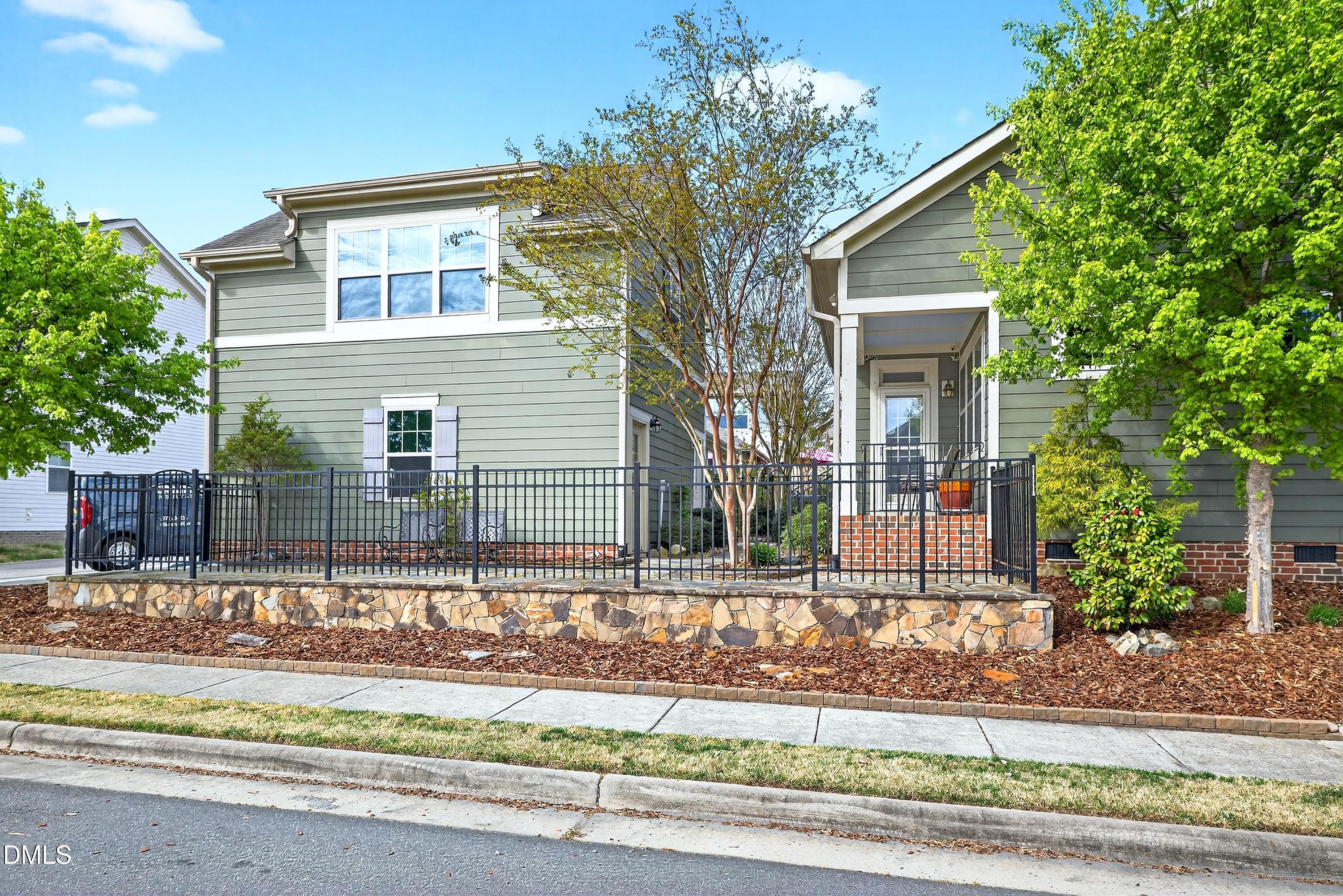2025 Great Ridge Parkway Chapel Hill, NC 27516 - Photo 49 of 61 front view of house with a yard