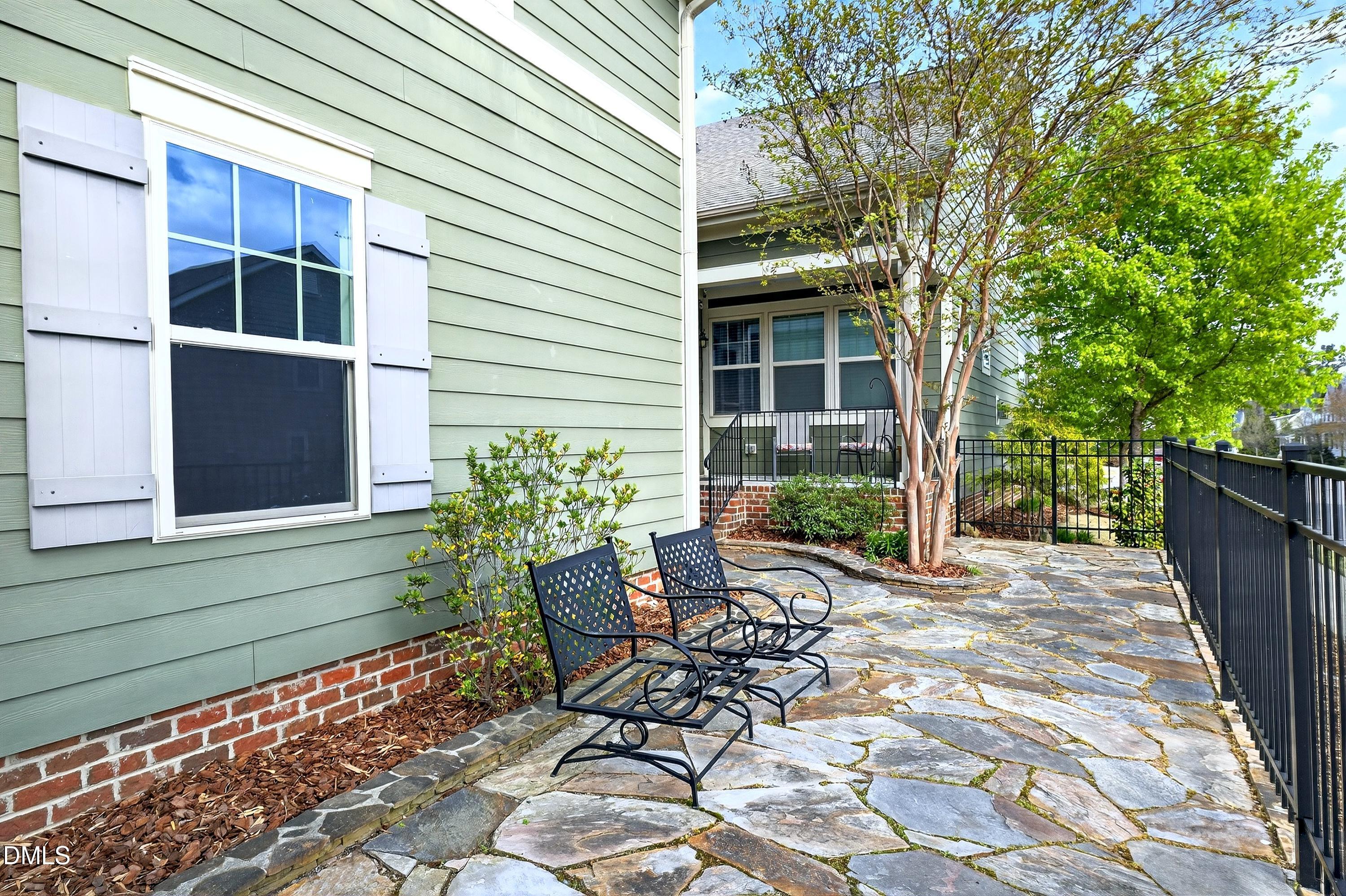2025 Great Ridge Parkway Chapel Hill, NC 27516 - Photo 51 of 61 a view of house with backyard and sitting area
