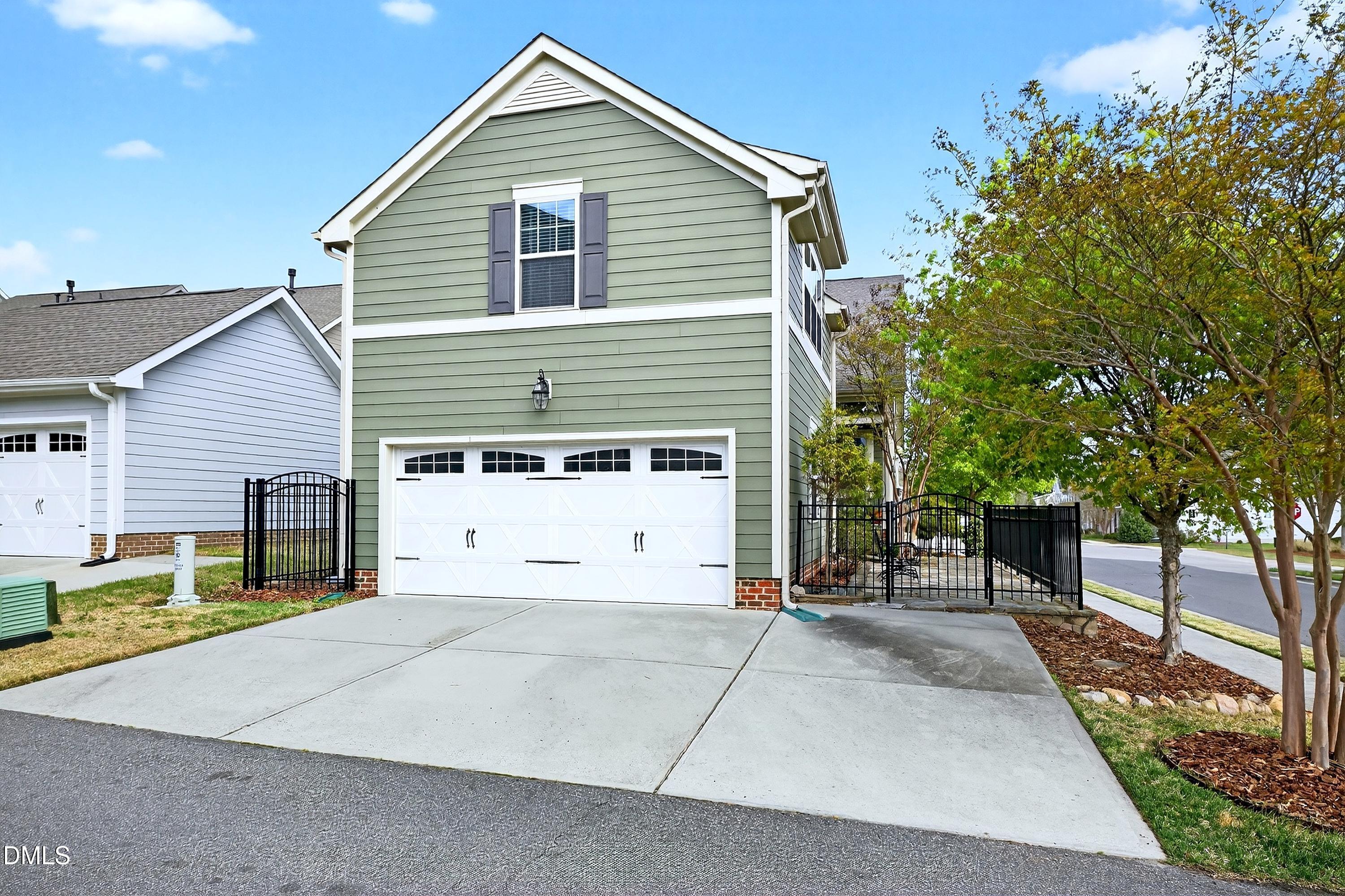 2025 Great Ridge Parkway Chapel Hill, NC 27516 - Photo 55 of 61 a view of a house with a yard