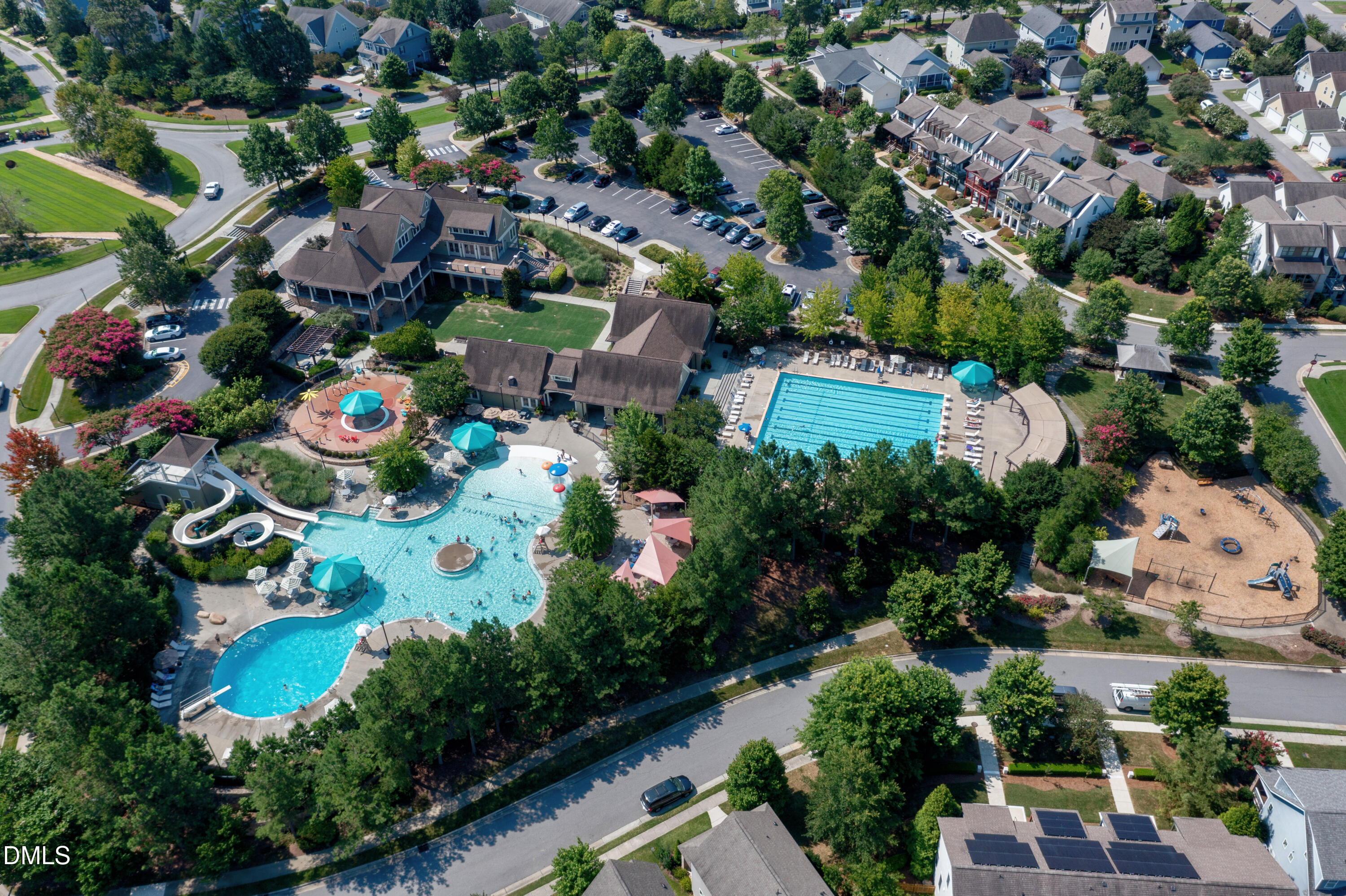2025 Great Ridge Parkway Chapel Hill, NC 27516 - Photo 56 of 61 an aerial view of residential houses with outdoor space and swimming pool