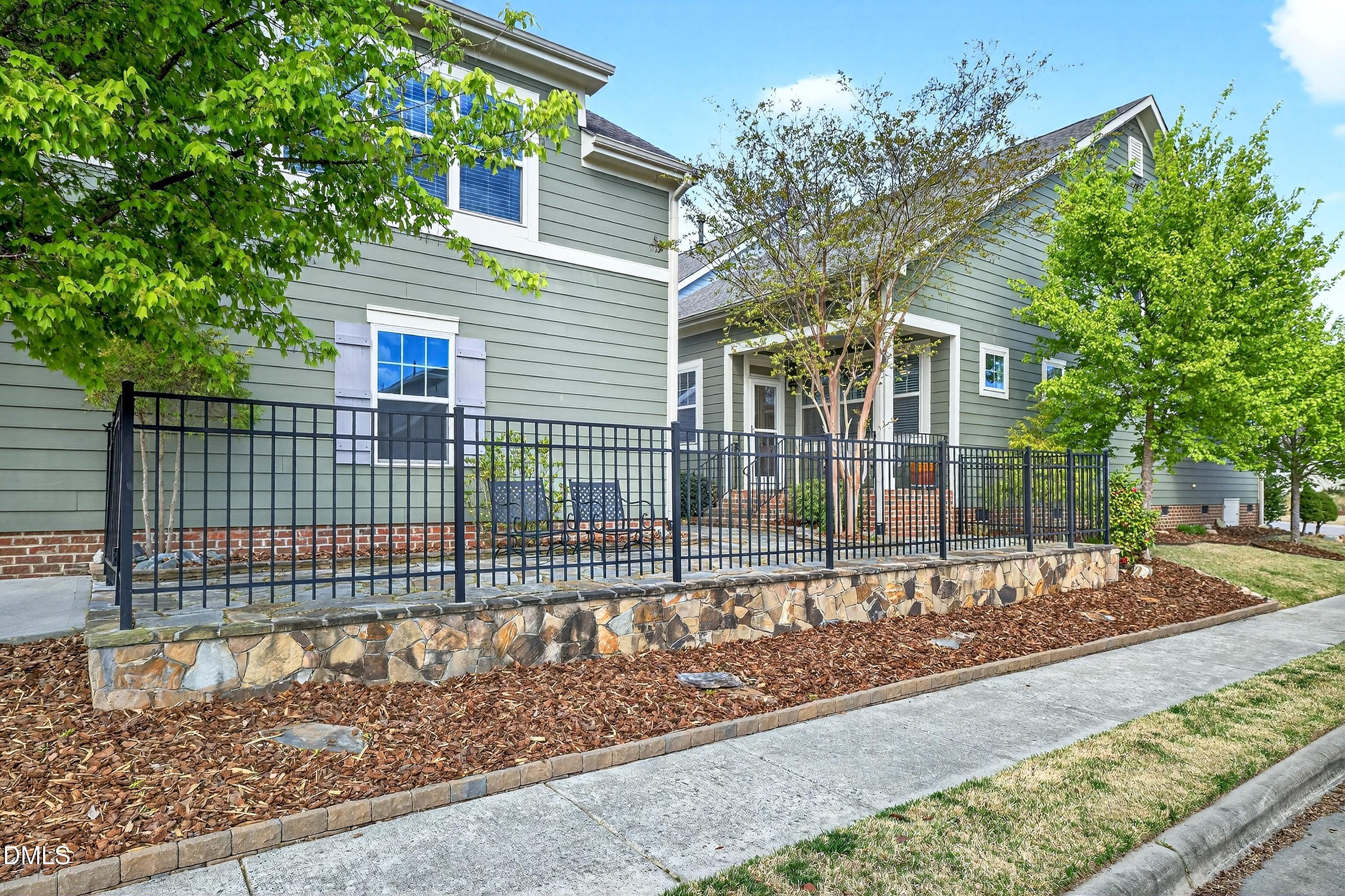 2025 Great Ridge Parkway Chapel Hill, NC 27516 - Photo 57 of 61 a view of a house with a fence