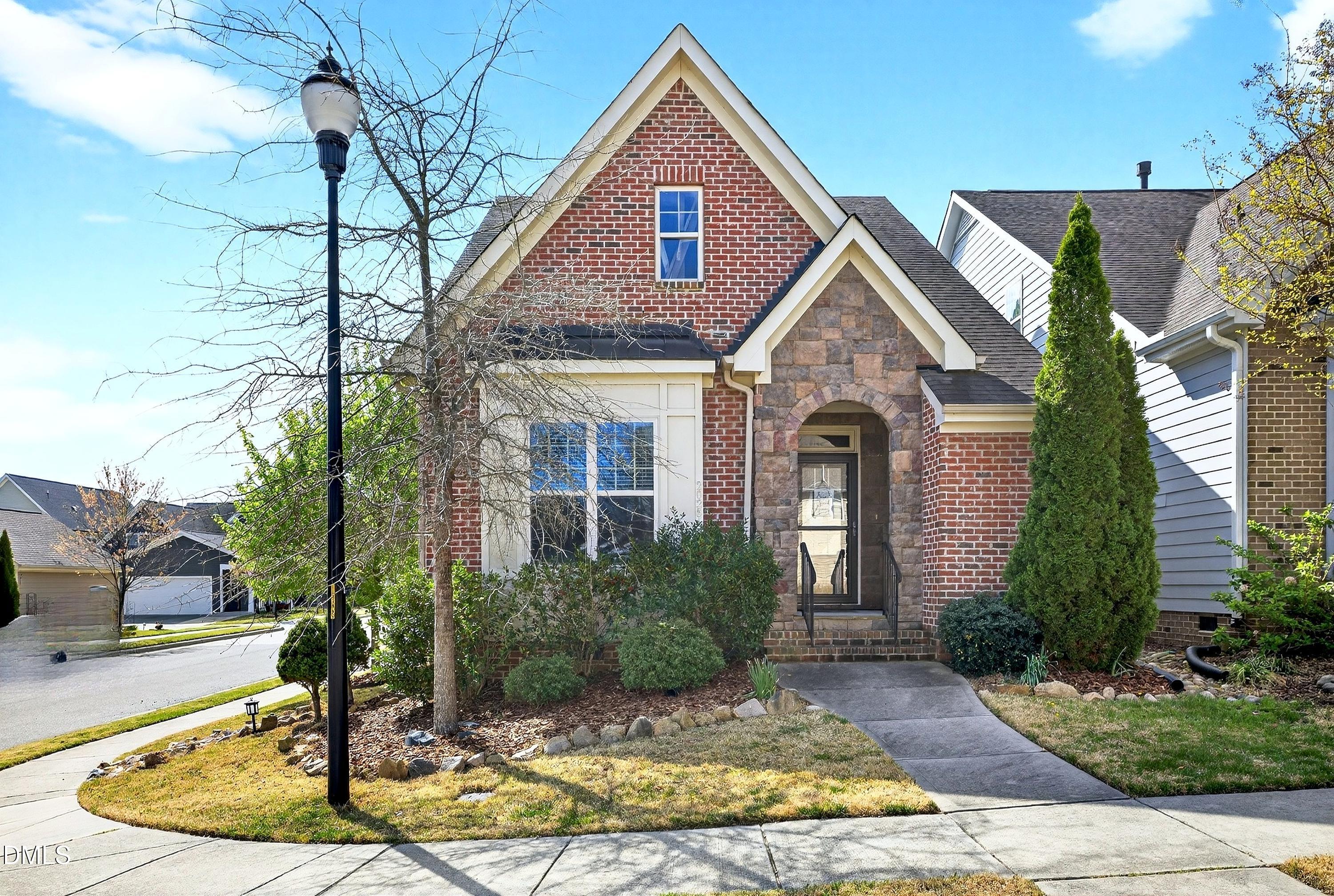2025 Great Ridge Parkway Chapel Hill, NC 27516 - Photo 59 of 61 a front view of a house with garden