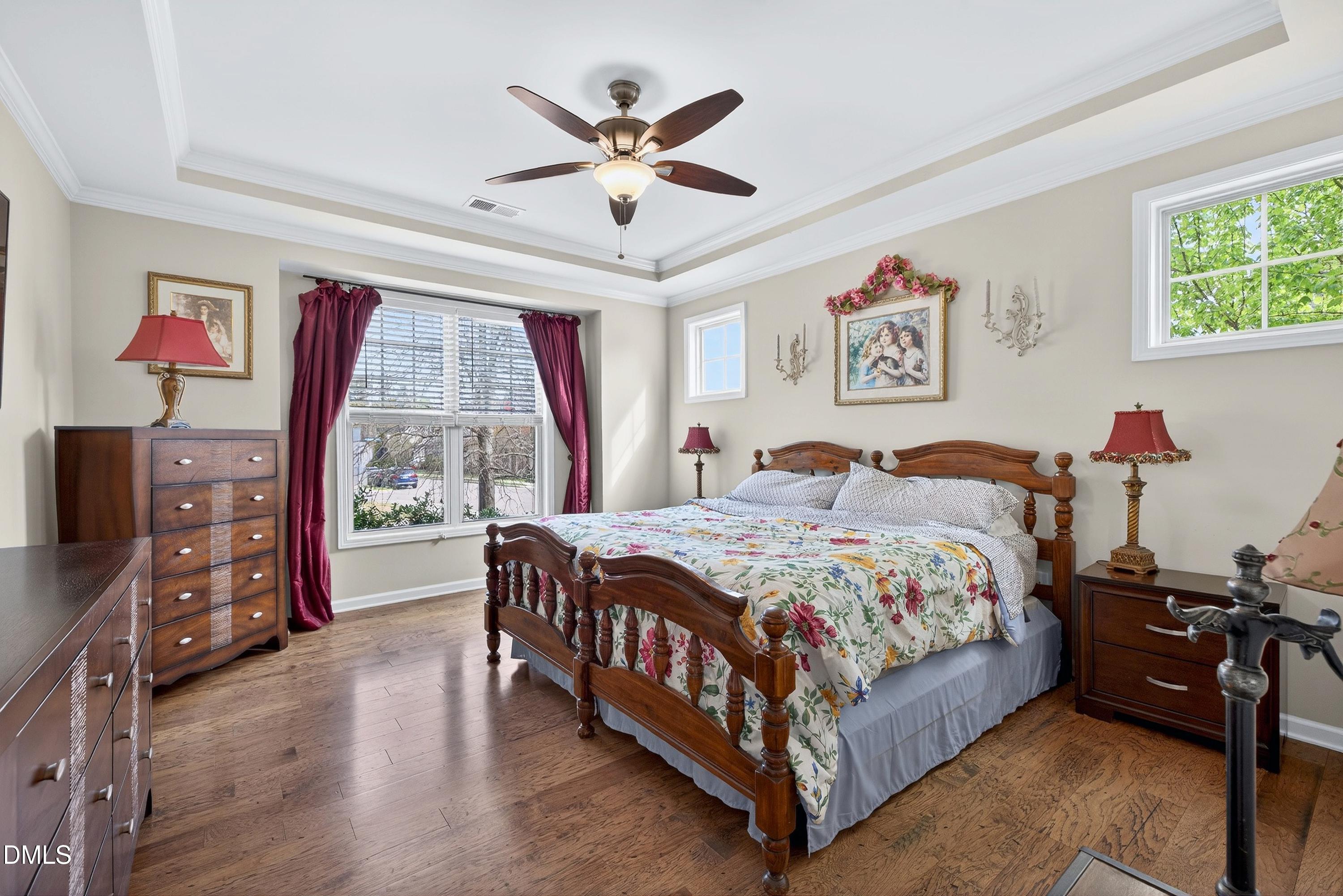2025 Great Ridge Parkway Chapel Hill, NC 27516 - Photo 10 of 61 a bed room with a bed and a large window