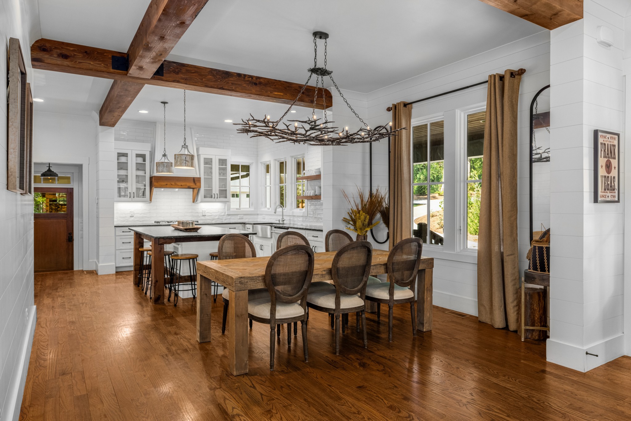 919 High Point Ridge Road Franklin, TN 37069 - Photo 17 of 53 a view of a dining room with furniture and wooden floor