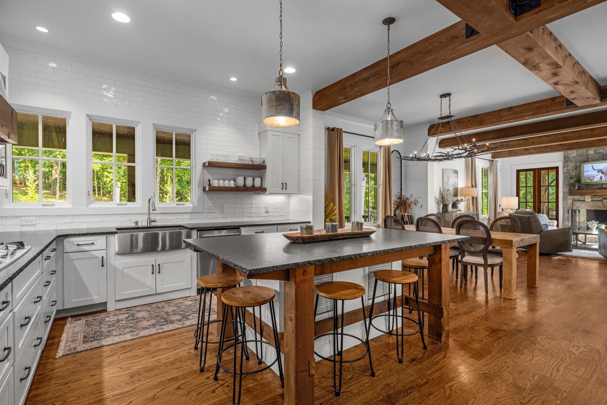 919 High Point Ridge Road Franklin, TN 37069 - Photo 20 of 53 a kitchen with counter space dining table and chairs