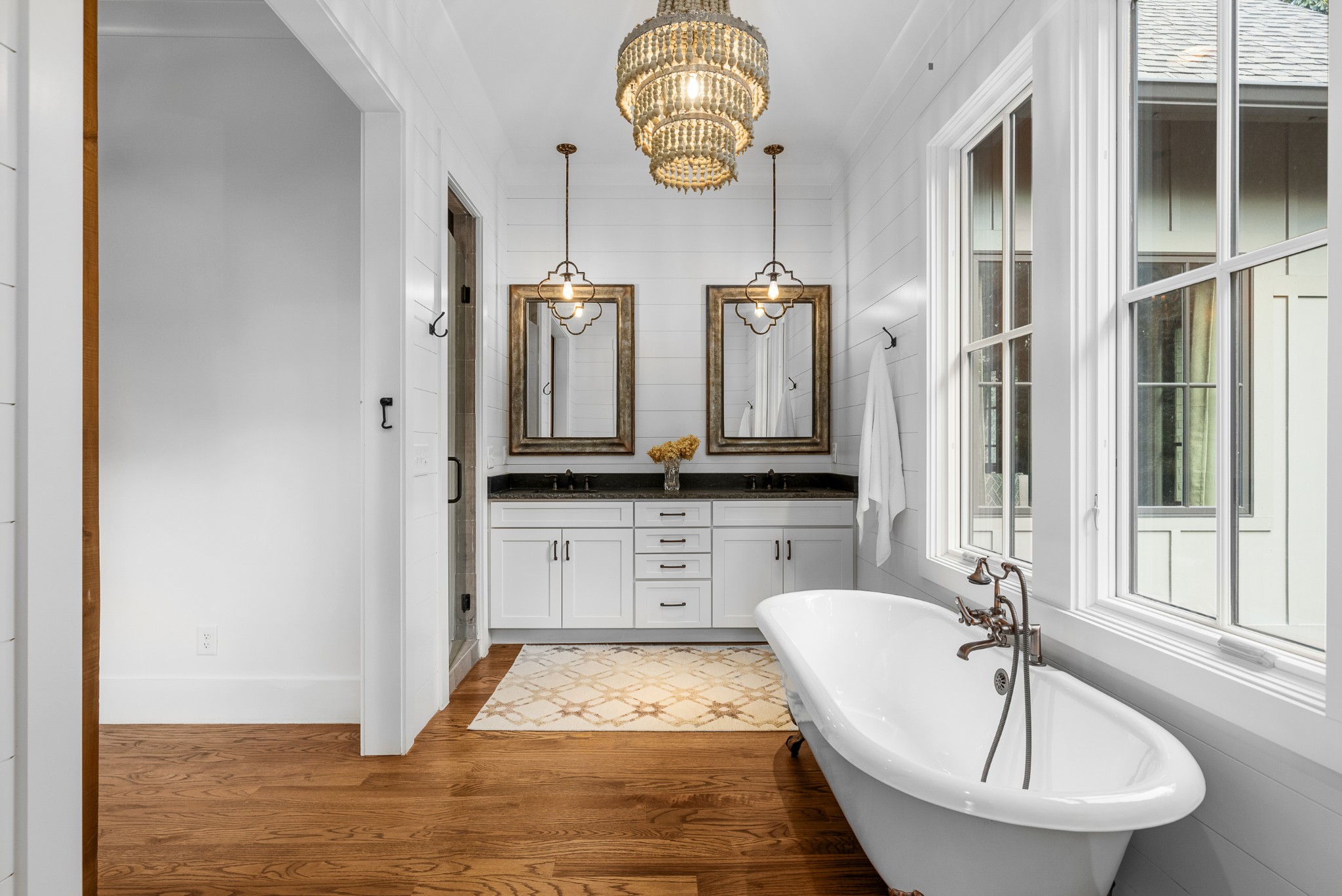 919 High Point Ridge Road Franklin, TN 37069 - Photo 24 of 53 a bathroom with a tub sink and mirror
