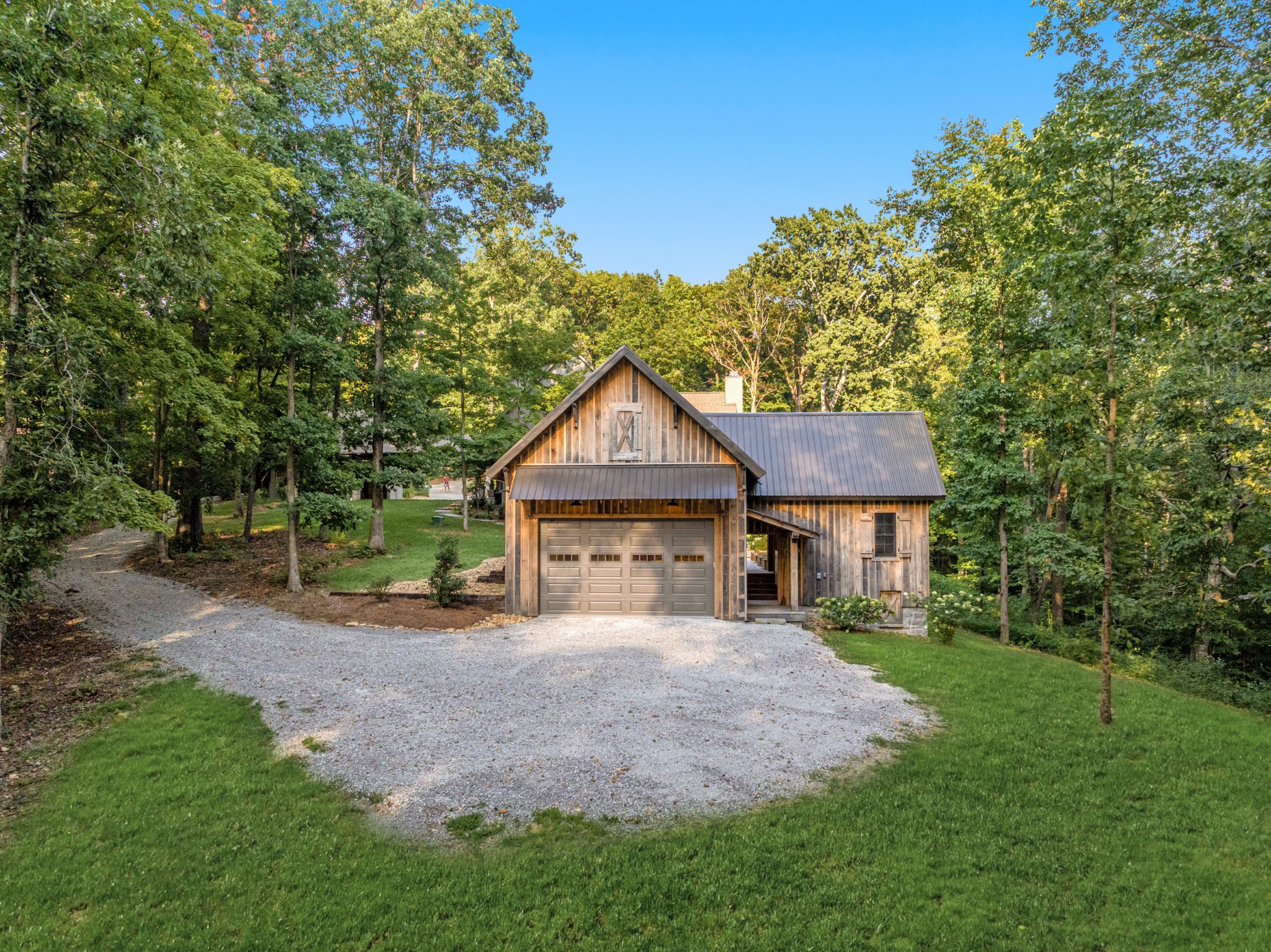 919 High Point Ridge Road Franklin, TN 37069 - Photo 40 of 53 a house view with a garden space