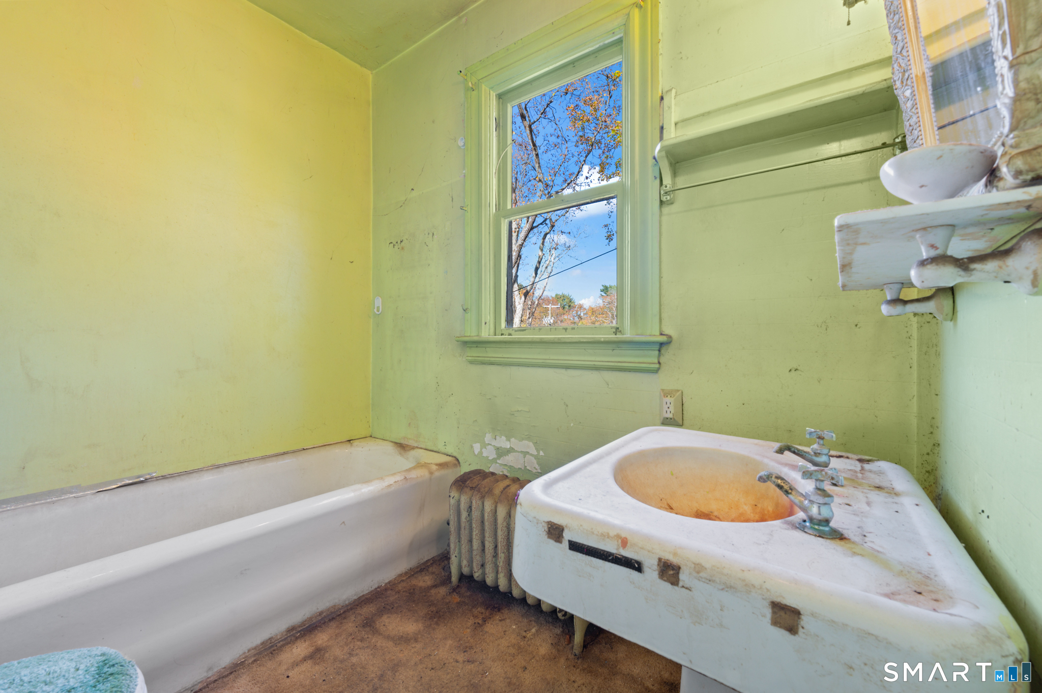 124 River Road Willington, CT 06279 - Photo 32 of 40 a bathroom with a tub and sink