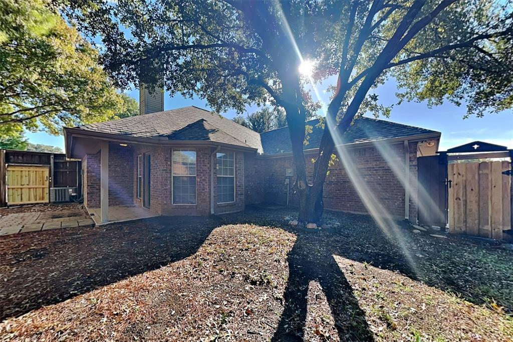 7641 Lancelot Road Frisco, TX 75035 - Photo 20 of 21 a front view of a house with garden