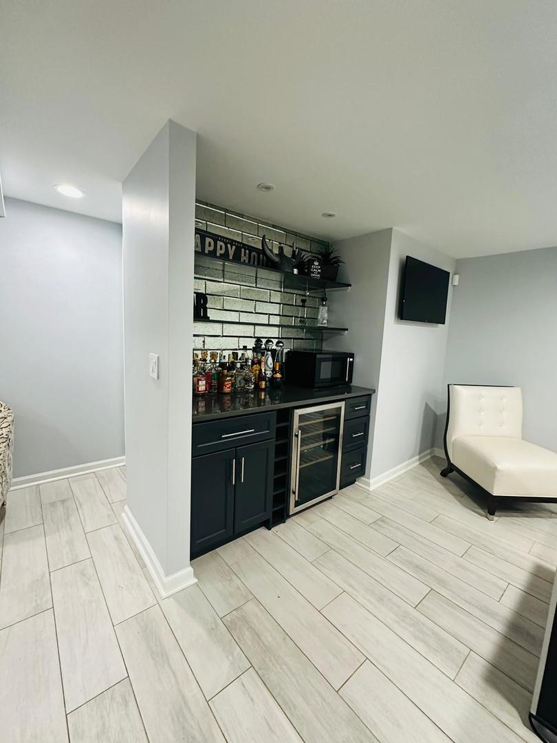 36W461 Binnie Road Dundee, IL 60118 - Photo 11 of 20 a room with a bed and a television