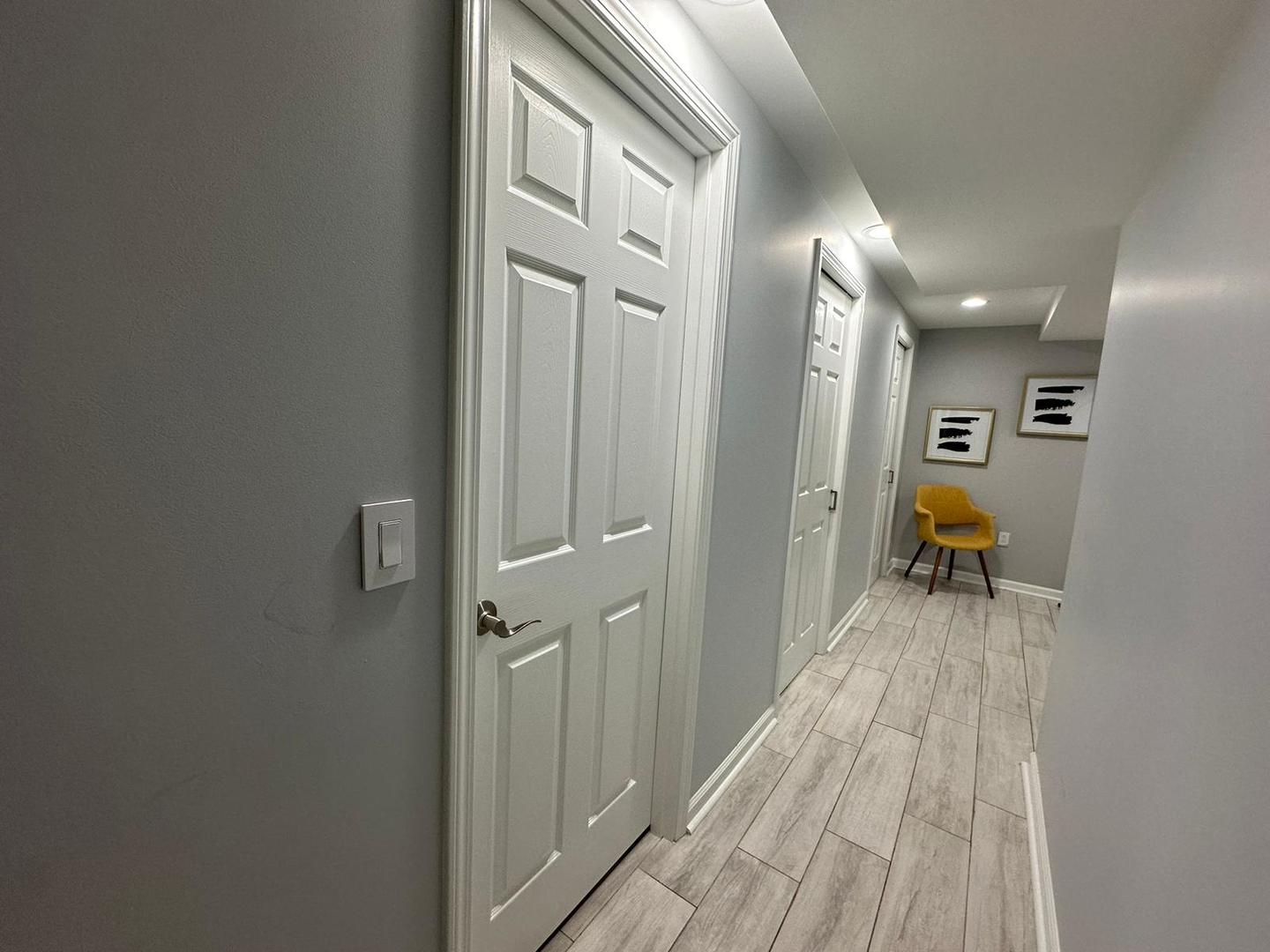 36W461 Binnie Road Dundee, IL 60118 - Photo 17 of 20 a view of hallway with livingroom and wooden floor
