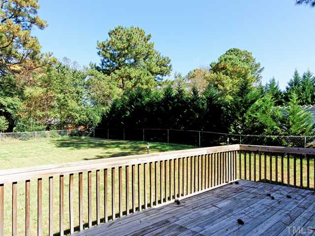 205 Spring Park Road Wake Forest, NC 27587 - Photo 15 of 25 Oversized deck overlooks the private back yard!