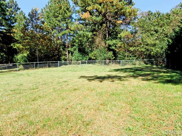 205 Spring Park Road Wake Forest, NC 27587 - Photo 16 of 25 Backs to wooded area for additional privacy!