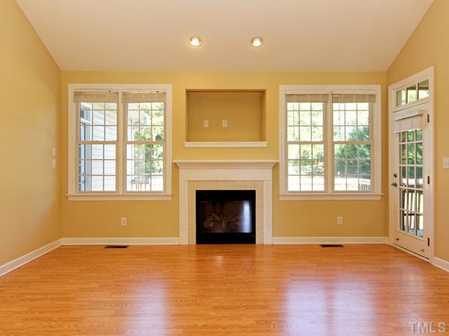 205 Spring Park Road Wake Forest, NC 27587 - Photo 6 of 25 Spacious family room with TV niche above fireplace!