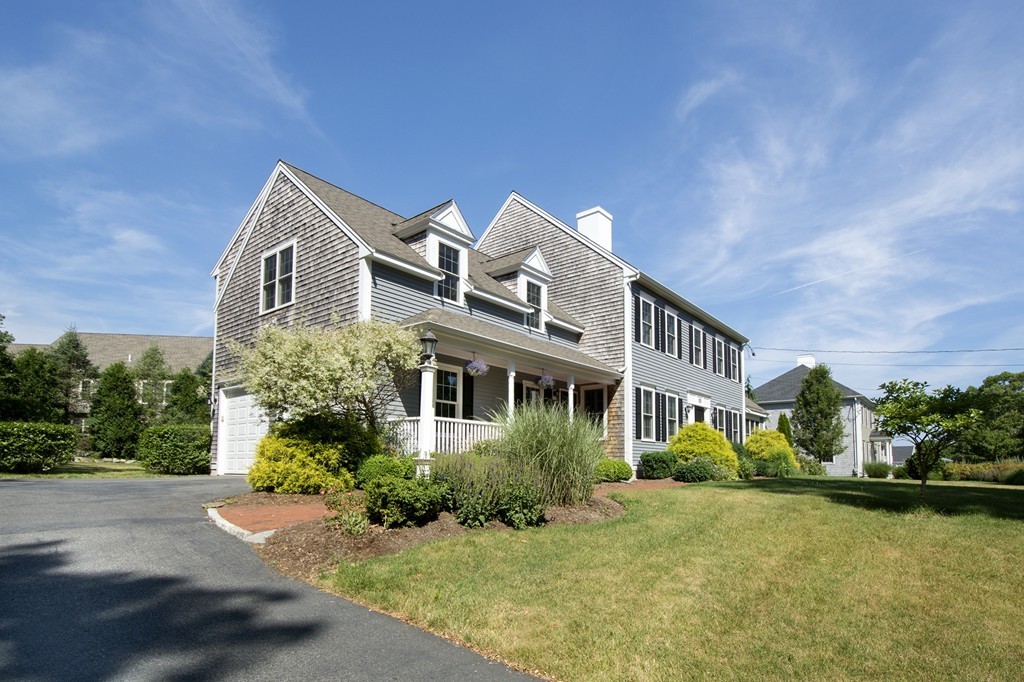 123 Tilden Road Scituate, MA 02066 - Photo 22 of 27 a front view of a house with garden
