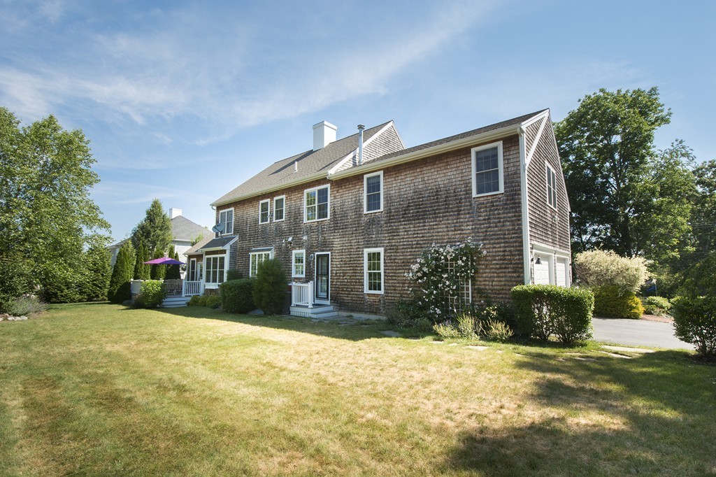 123 Tilden Road Scituate, MA 02066 - Photo 23 of 27 a front view of a house with a yard