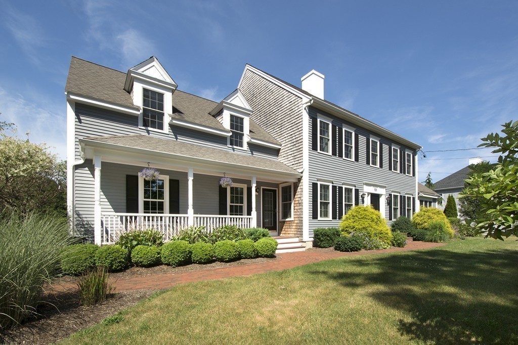 123 Tilden Road Scituate, MA 02066 - Photo 27 of 27 a front view of a house with a garden