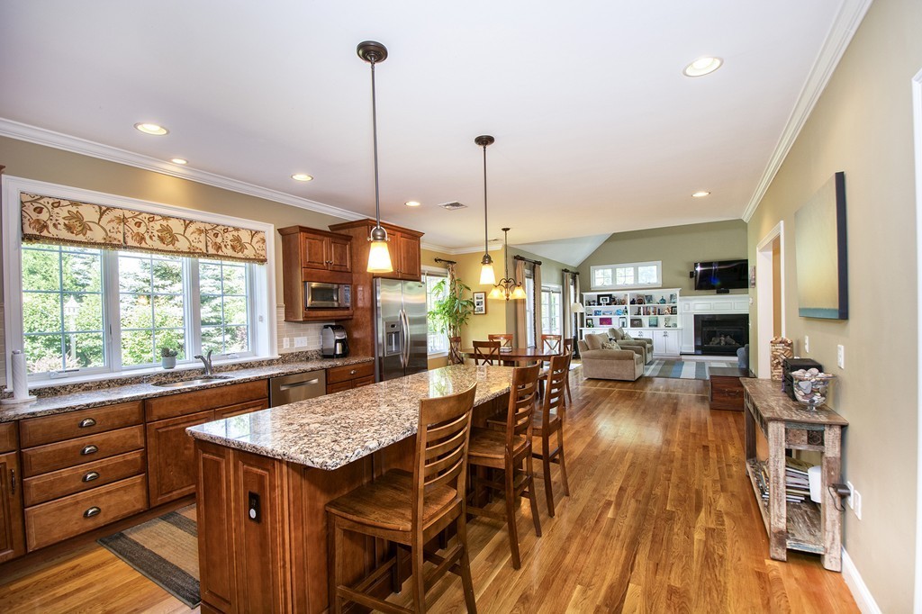 123 Tilden Road Scituate, MA 02066 - Photo 4 of 27 a view of a kitchen and dining room