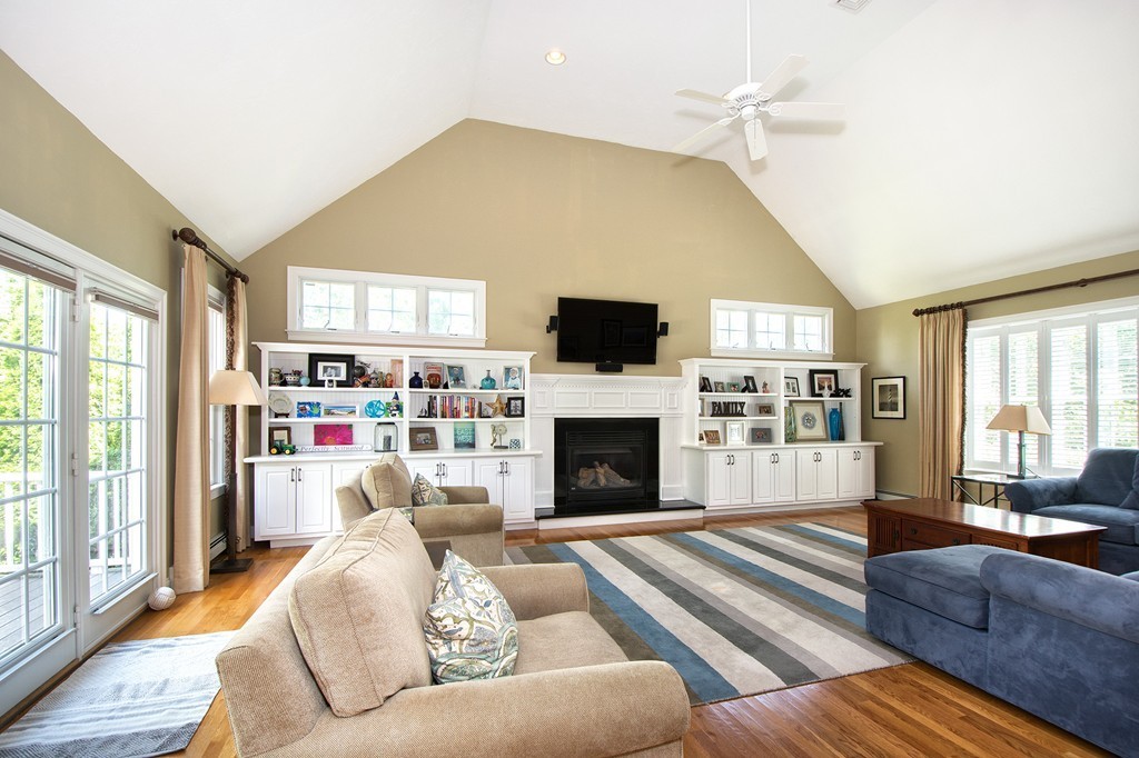 123 Tilden Road Scituate, MA 02066 - Photo 6 of 27 a living room with furniture fireplace and flat screen tv