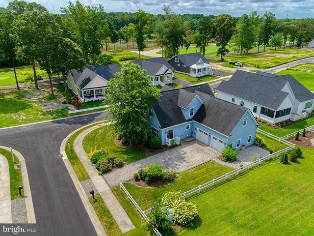 an aerial view of a house with outdoor space swimming pool and outdoor seating