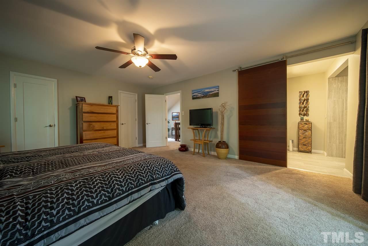 2001 Cayuga Place Raleigh, NC 27612 - Photo 10 of 21 Custom made barn door to spa like bathroom