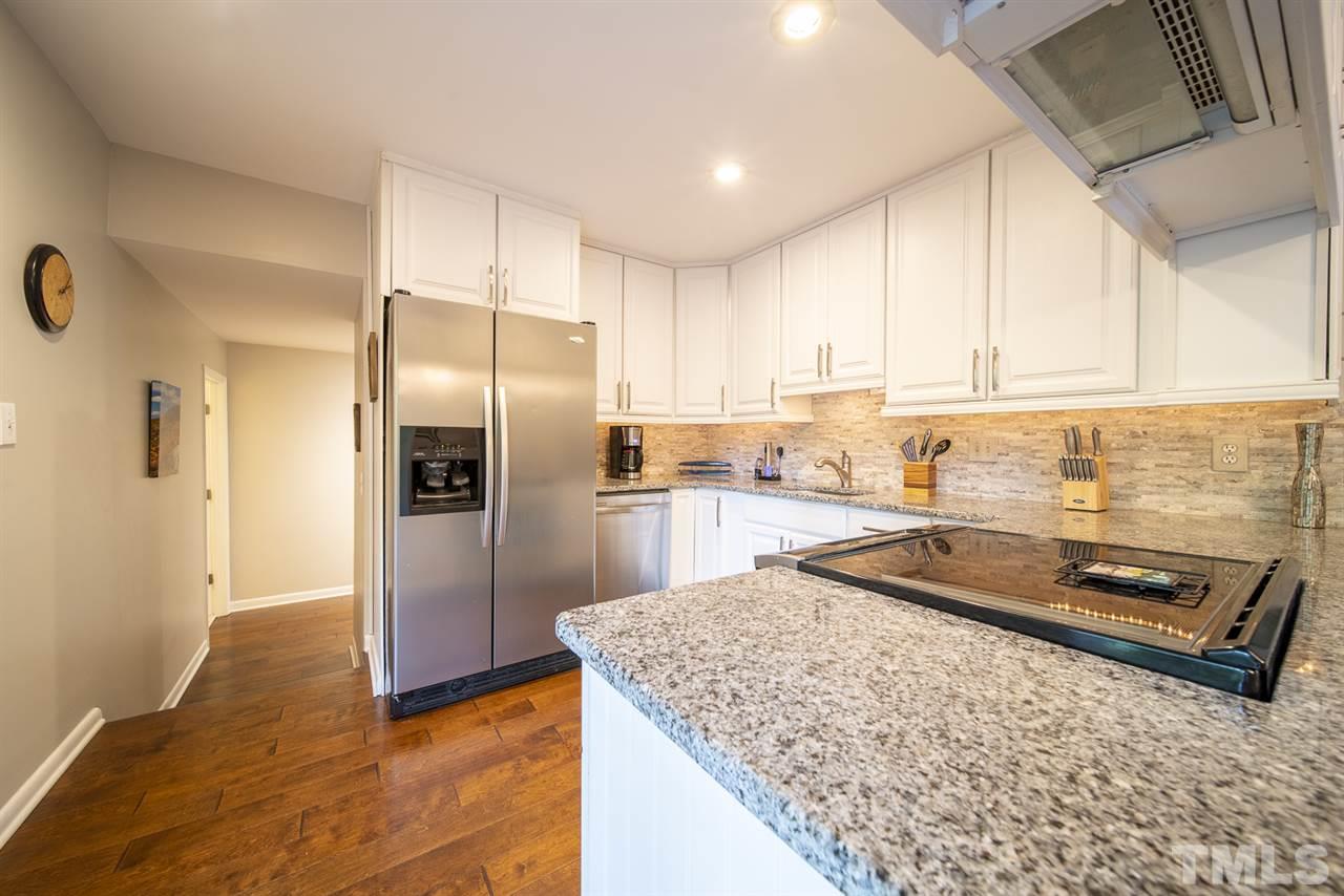 2001 Cayuga Place Raleigh, NC 27612 - Photo 8 of 21 Check out the stone backsplash