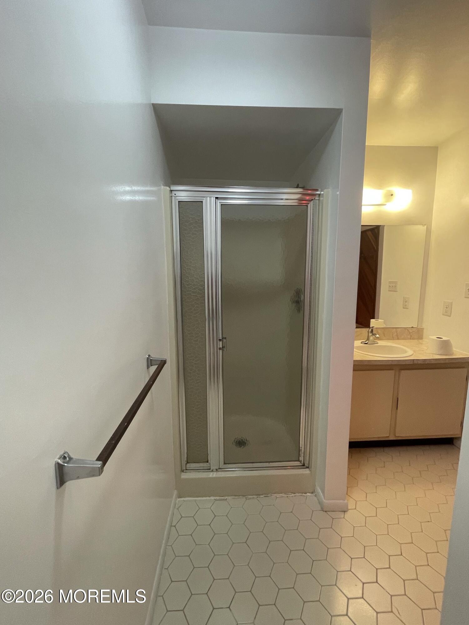 19 Clavendon Court Middletown, NJ 07748 - Photo 12 of 21 a bathroom with a tub shower and sink
