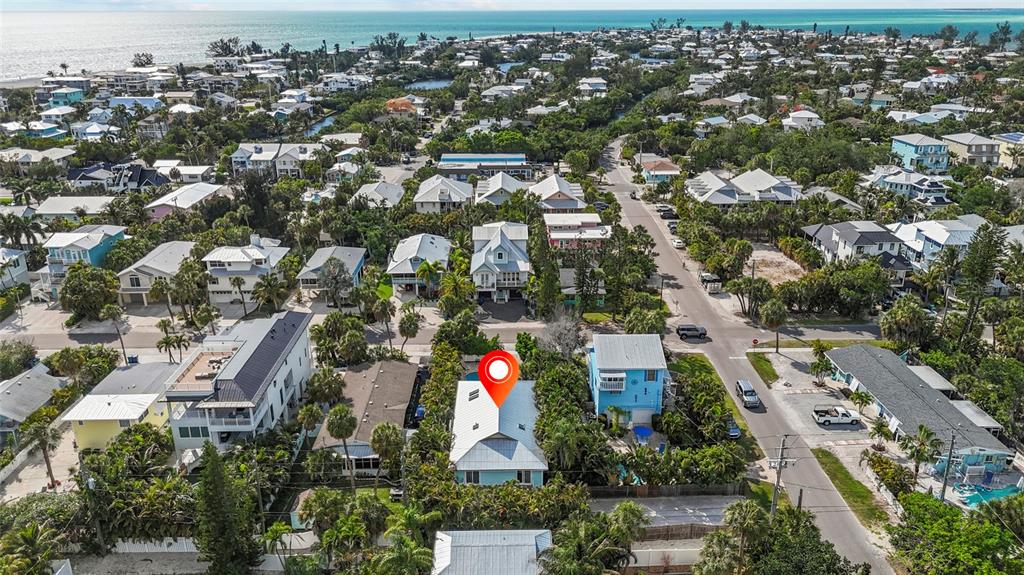 315 Spring Avenue Anna Maria, FL 34216 - Photo 51 of 63 an aerial view of residential houses with outdoor space
