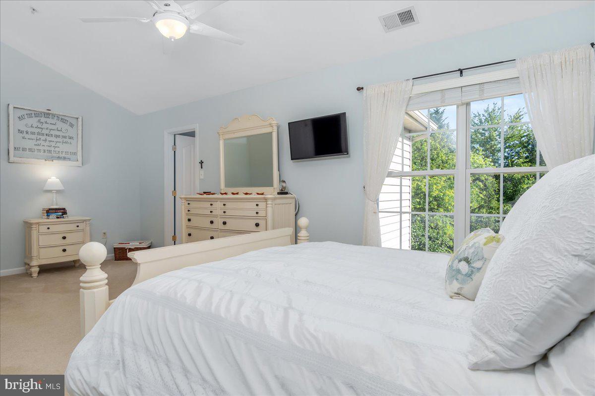 2003 Buell Drive Frederick, MD 21702 - Photo 10 of 32 a bedroom with a bed and large windows