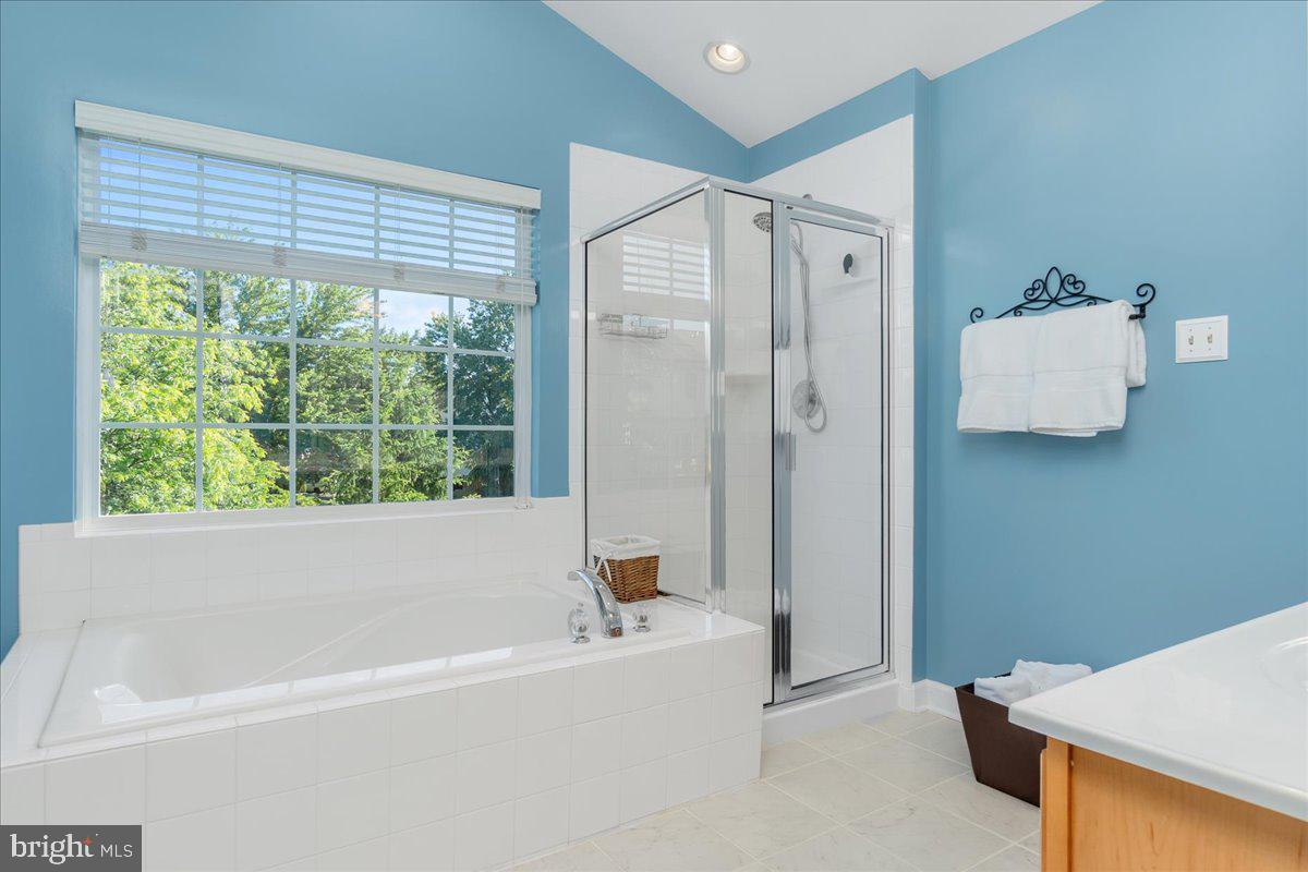 2003 Buell Drive Frederick, MD 21702 - Photo 11 of 32 a bathroom with a bathtub and a shower