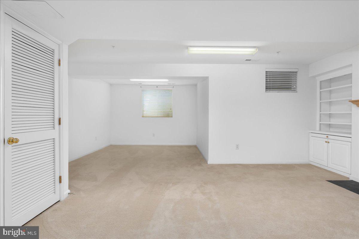 2003 Buell Drive Frederick, MD 21702 - Photo 16 of 32 an empty room with windows and closet