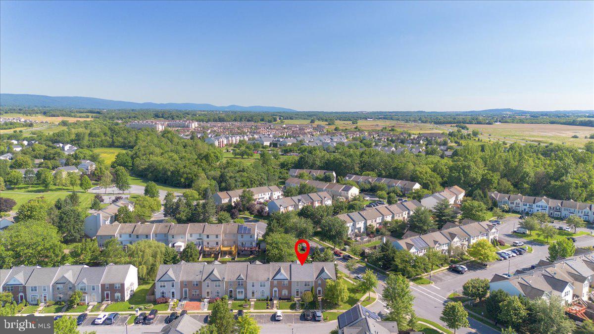 2003 Buell Drive Frederick, MD 21702 - Photo 24 of 32 an aerial view of a city with lots of residential buildings and ocean view in back