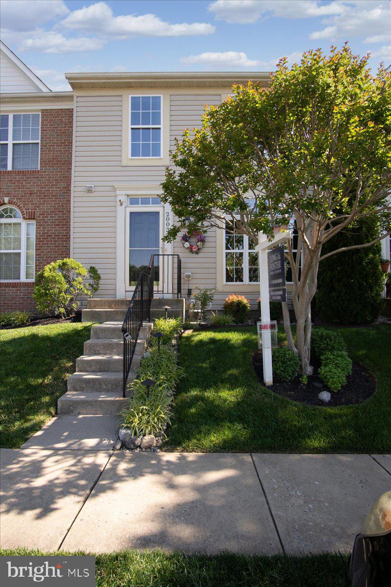 2003 Buell Drive Frederick, MD 21702 - Photo 31 of 32 a front view of a house with a garden