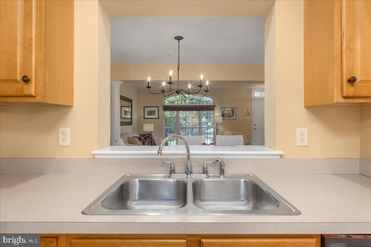 2003 Buell Drive Frederick, MD 21702 - Photo 8 of 32 a kitchen with a sink and chandelier