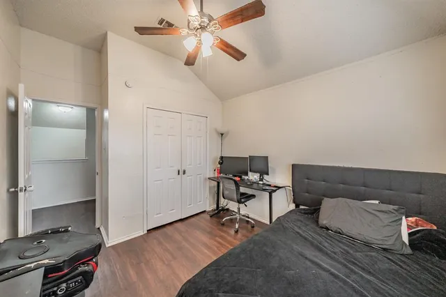 a bedroom with a bed and furniture