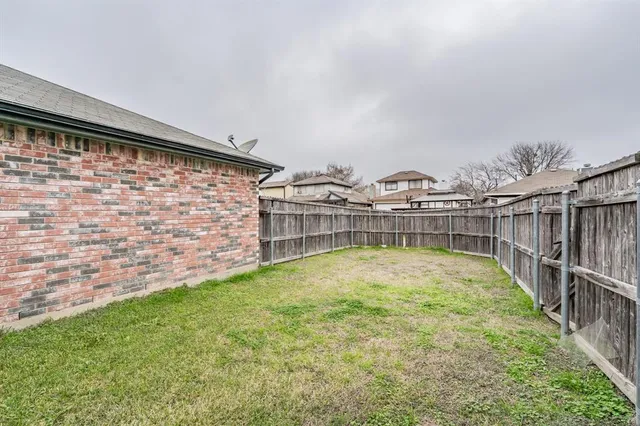 a view of a swimming pool with a garden