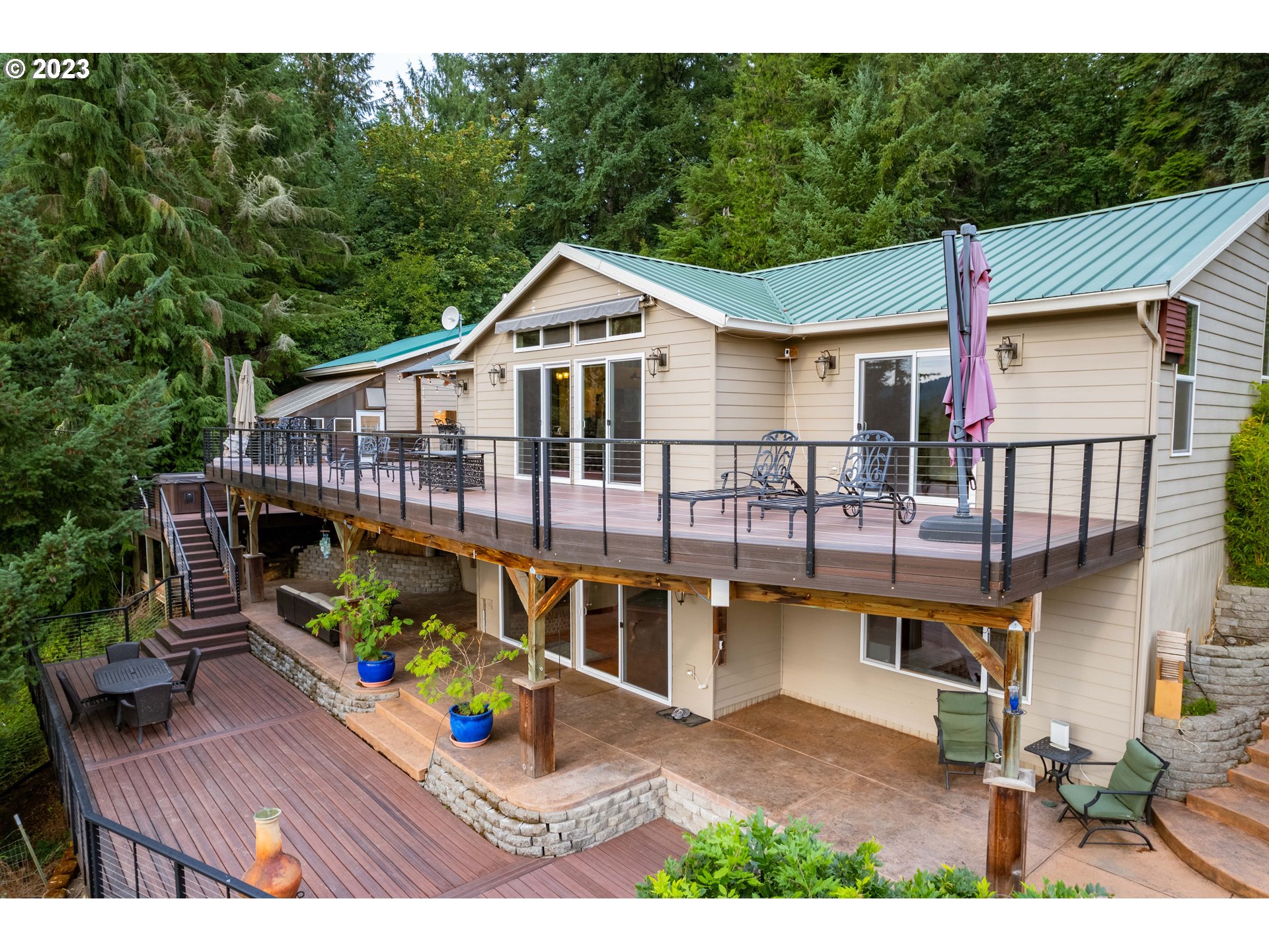 39350 Eagles Rest Road Dexter, OR 97431 - Photo 2 of 42 a view of a house with roof deck