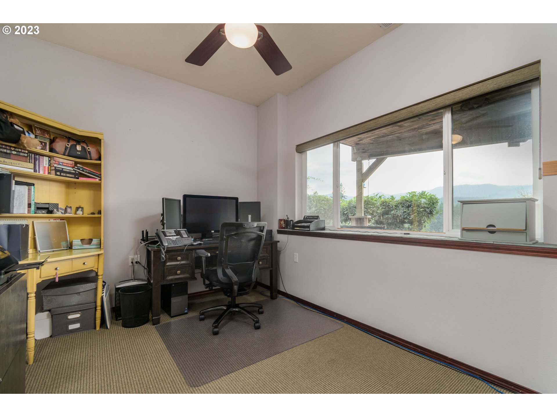 39350 Eagles Rest Road Dexter, OR 97431 - Photo 26 of 42 a view of a workspace with furniture and a window