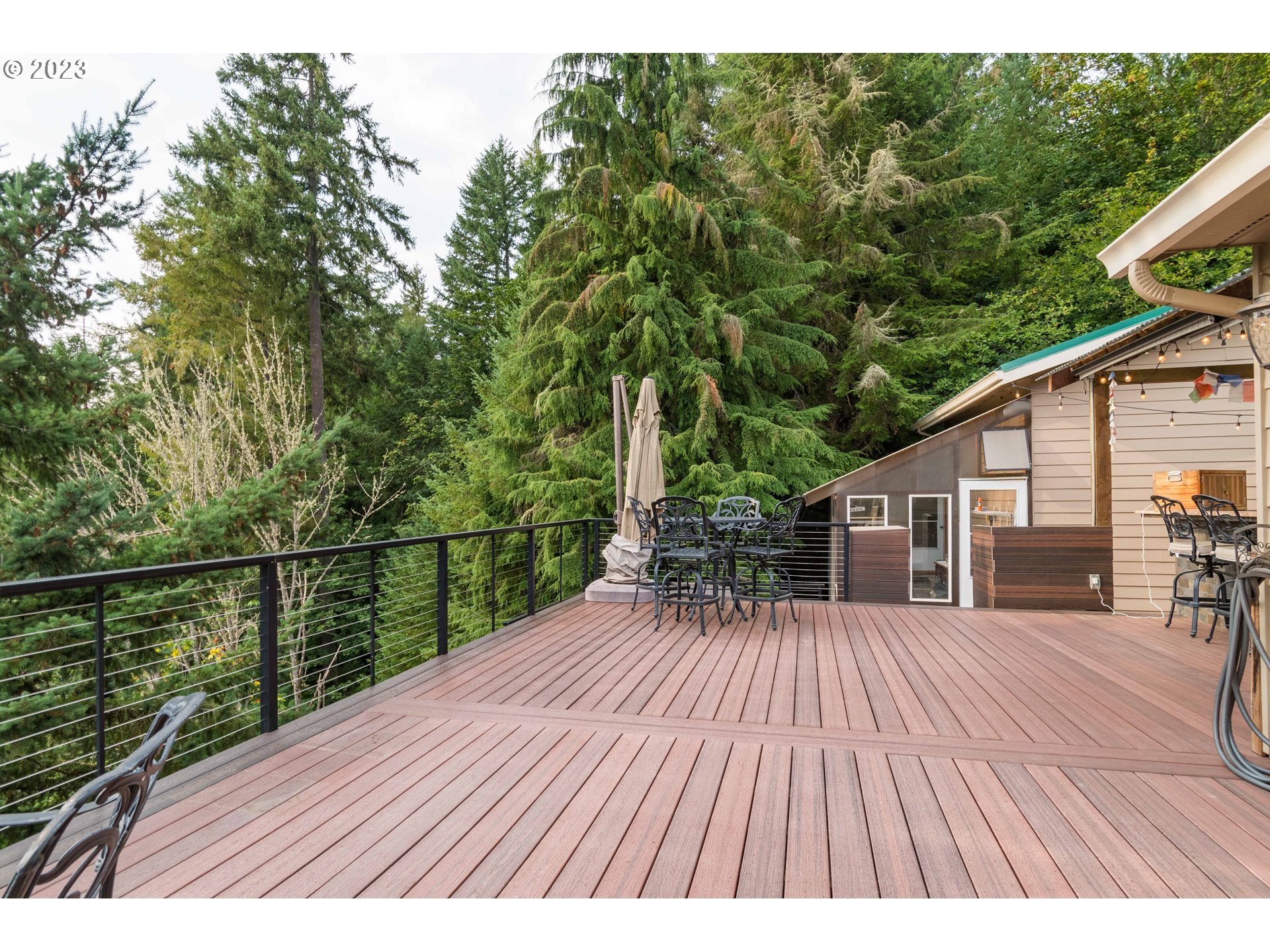 39350 Eagles Rest Road Dexter, OR 97431 - Photo 31 of 42 a view of deck with wooden floor and seating space